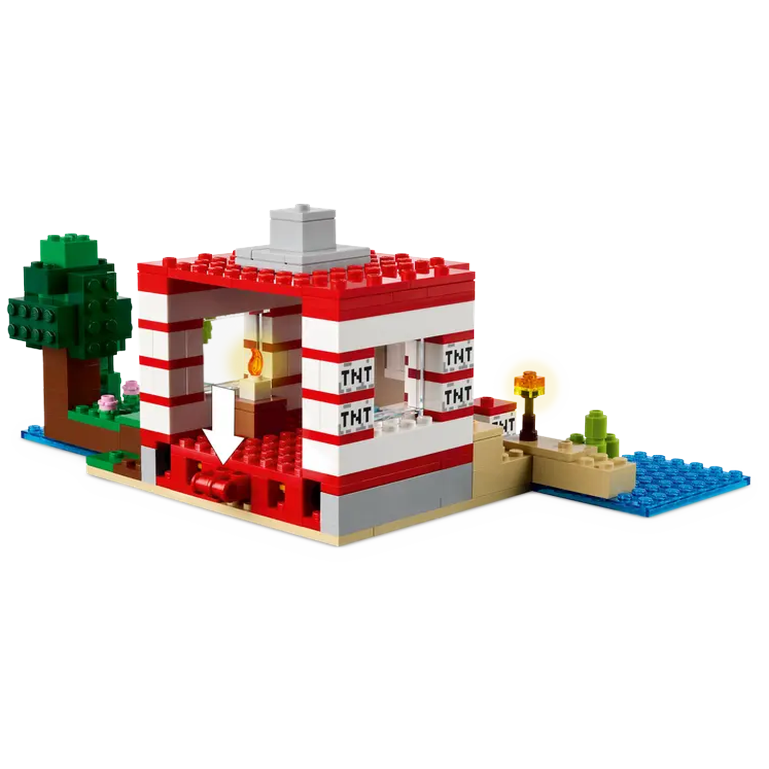 A Lego structure with red and white walls, TNT signs, a tree, and a small island with water and a torch.