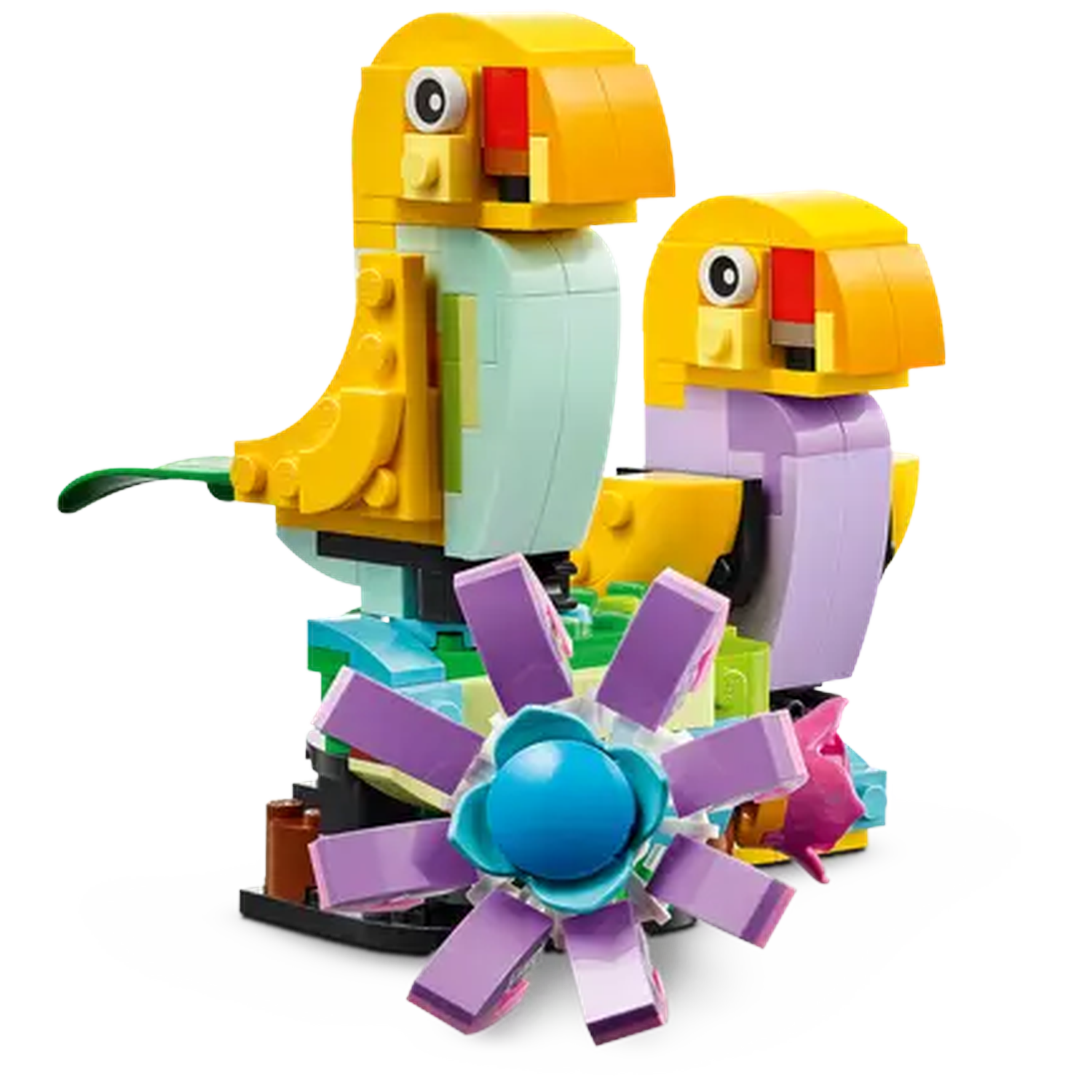 Two Lego birds, yellow, light blue, and purple. One bird has a green leaf. They are near a purple flower with a blue center.