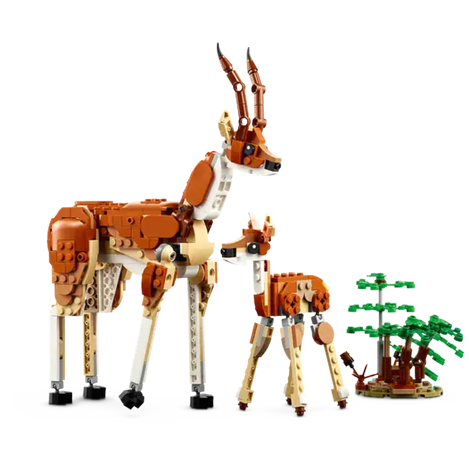 A Lego set of two deer, brown and white, with a small tree. The larger deer stands beside the smaller one.