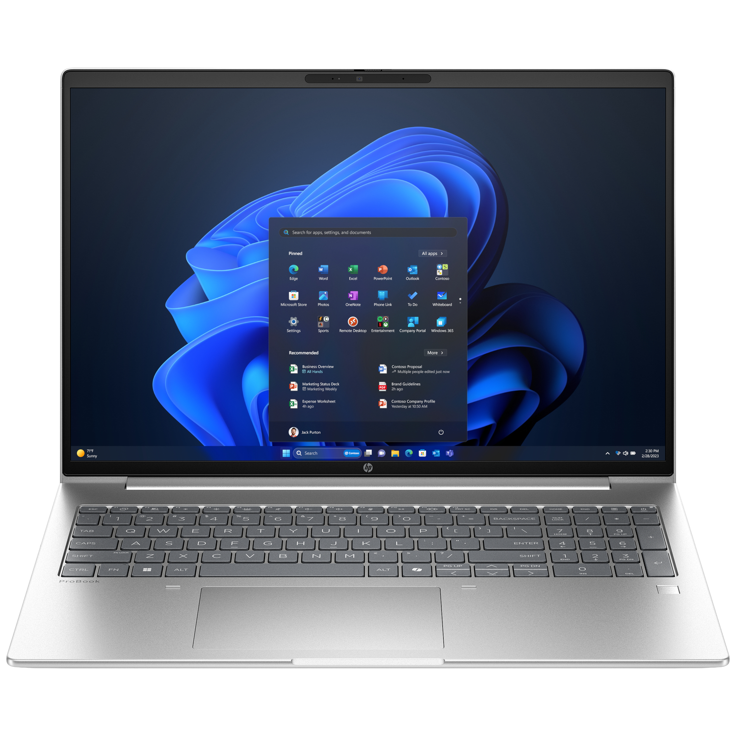 Ordinateur portable avec interface Windows 11 ouverte. Clavier visible. Applications épinglées à l'écran, y compris Edge, Word, Excel et Outlook.