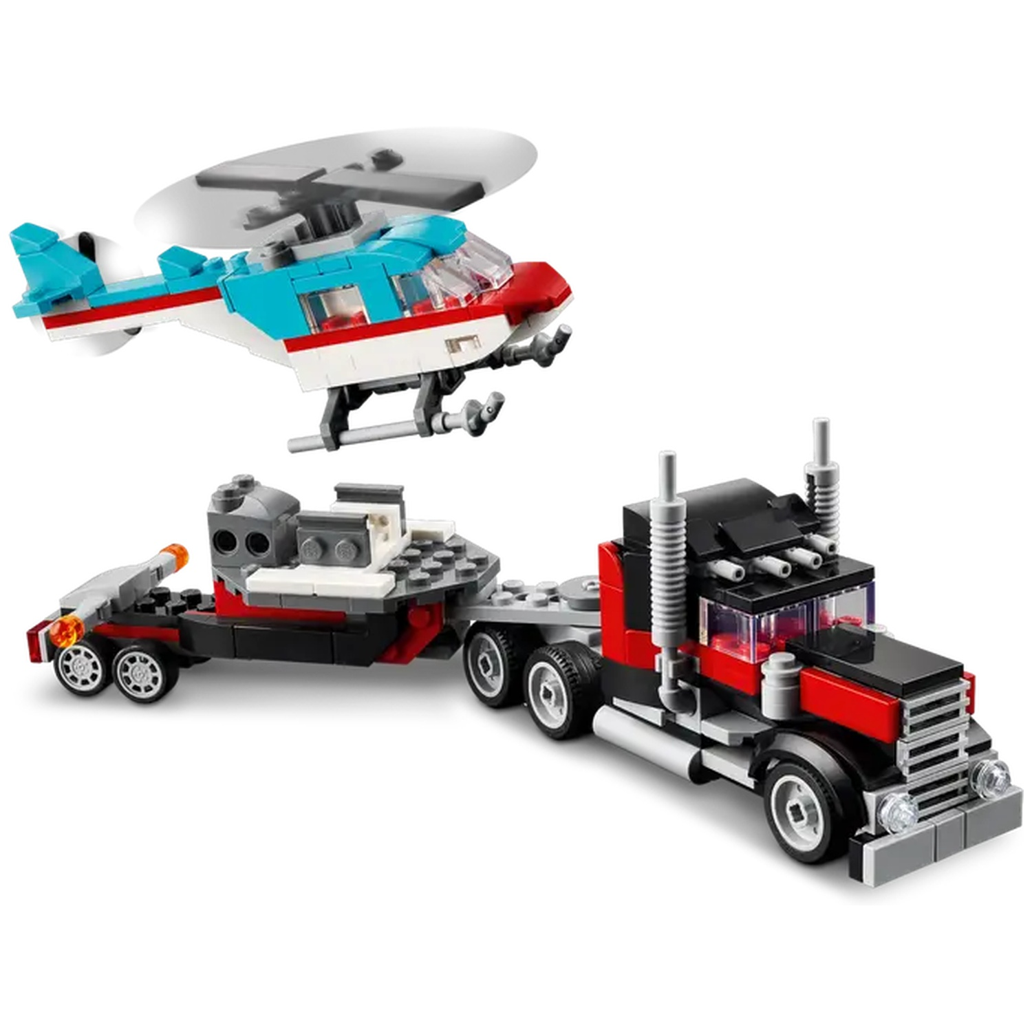 A Lego set featuring a helicopter, a black and red truck, and a trailer. The helicopter is blue, white, and red.