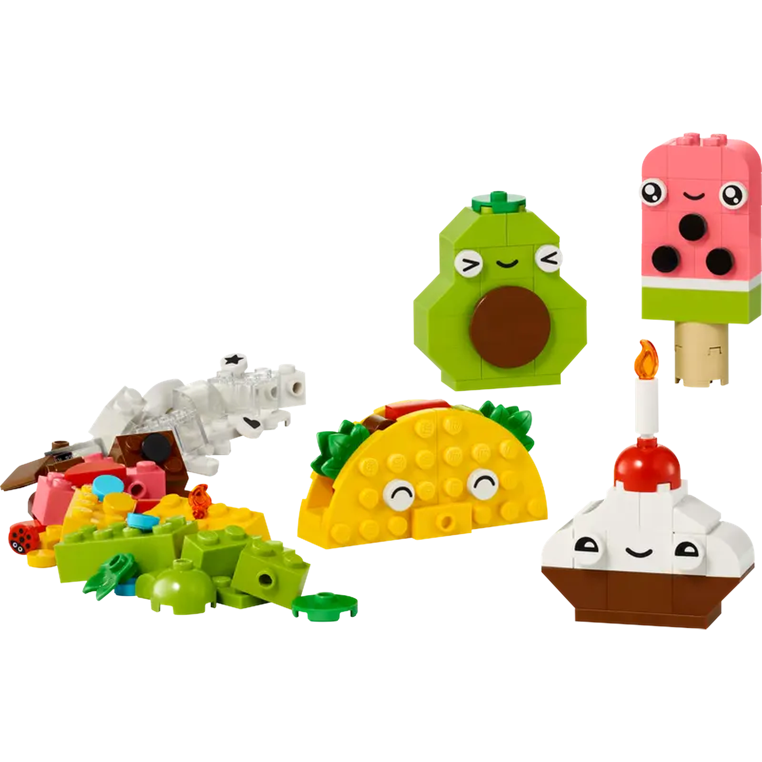 Modèles alimentaires Lego : avocat, taco, glace, cupcake et blocs éparpillés. Tous les modèles ont des visages souriants.