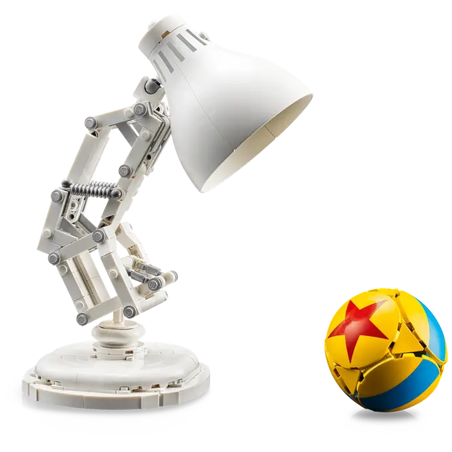 A white desk lamp and a ball with a red star on a white background. The lamp is angled downwards, and the ball is on the right.