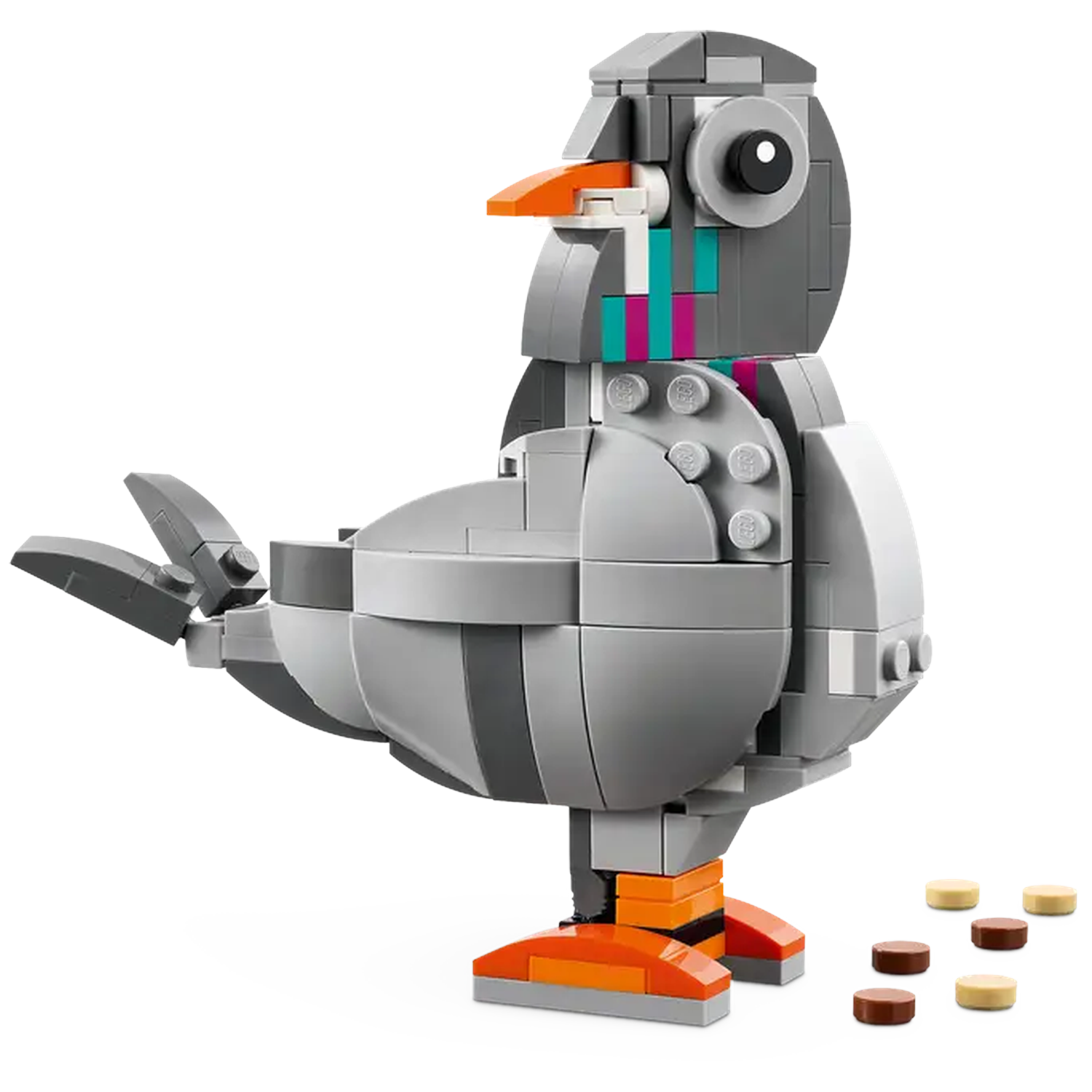 Een Lego duif staat, grijze lichaam, oranje poten en snavel. Enkele kleurrijke blokken op de kop. Verschillende ronde bruine en gele stukken beneden.