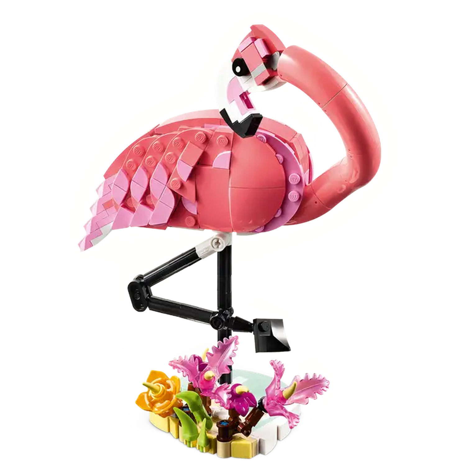 A Lego flamingo, pink and white, with black legs, stands on a small base with flowers. The flamingo's head is curved.