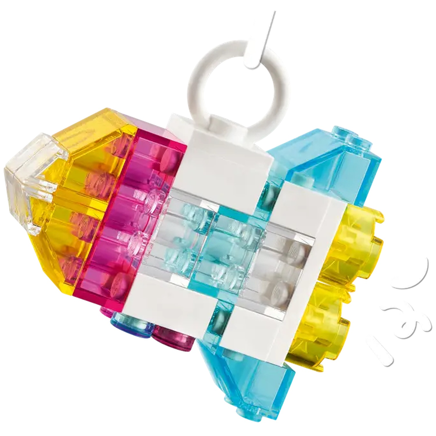 Un ornement de fusée Lego coloré. Il a des briques jaunes, roses, bleues et transparentes avec un anneau blanc pour suspendre.