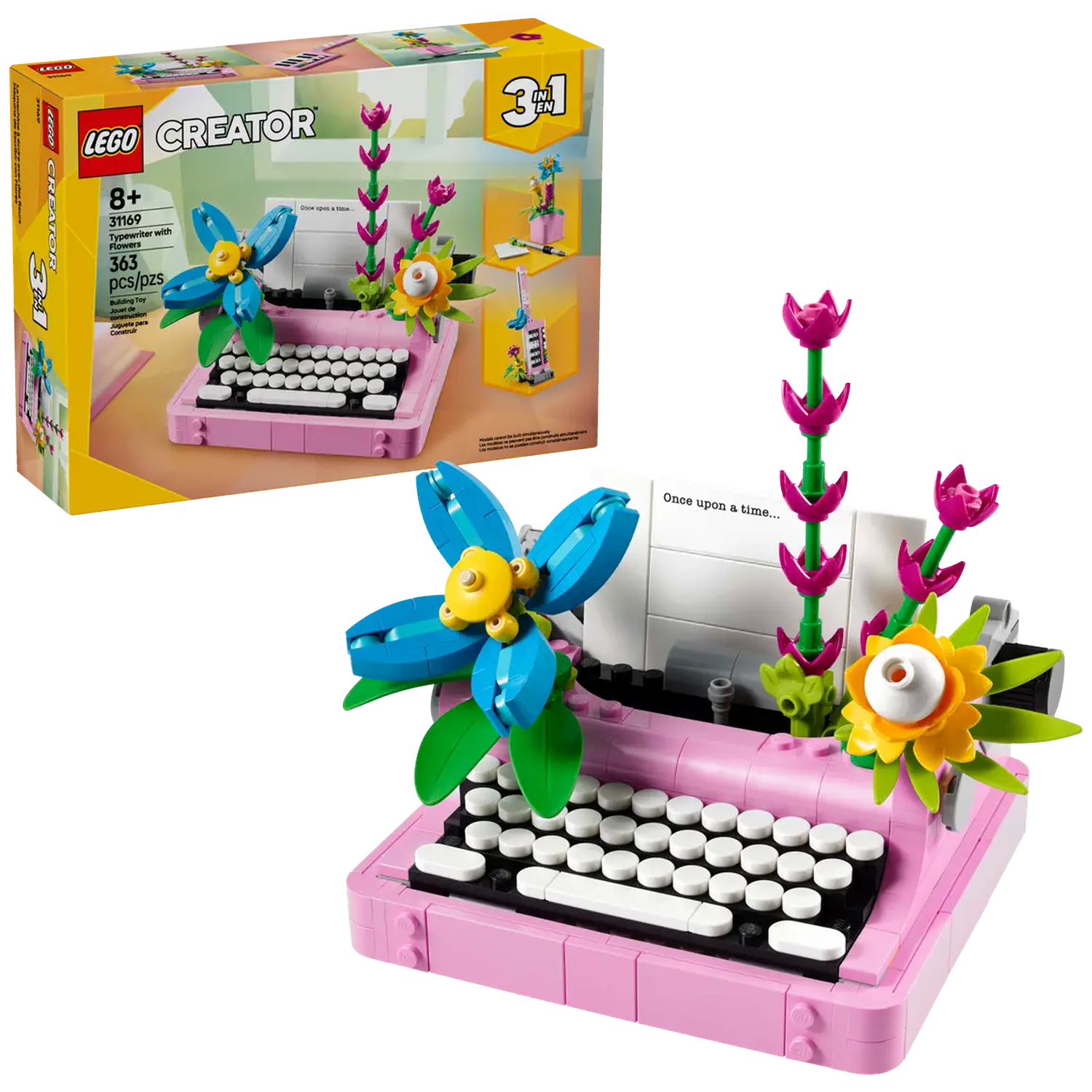 Een Lego-set van een roze typemachine met blauwe en gele bloemdecoraties. Een doos met de Lego-set staat op de achtergrond.