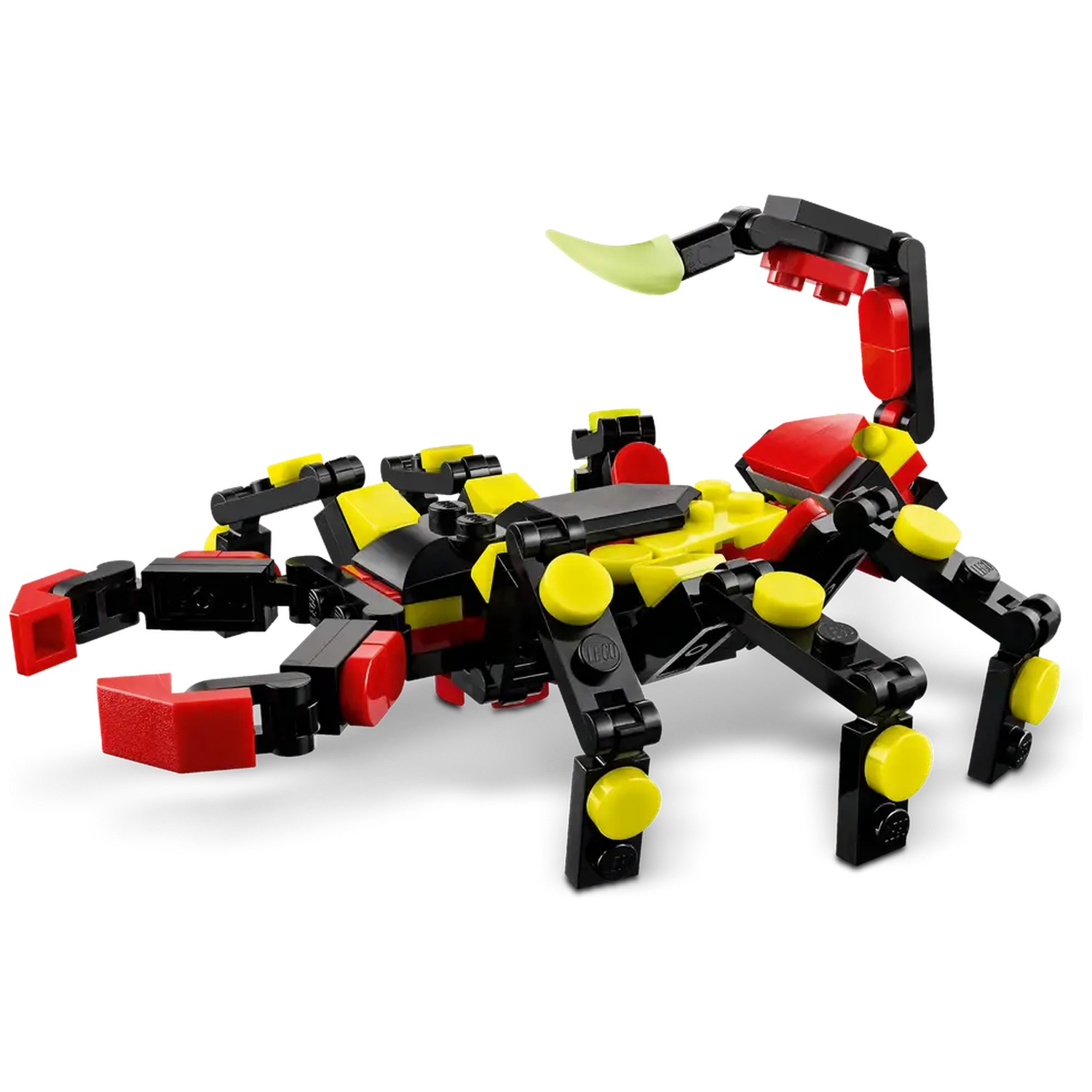 A LEGO scorpion model. It has black, yellow, and red parts. The tail is curved with a green stinger.