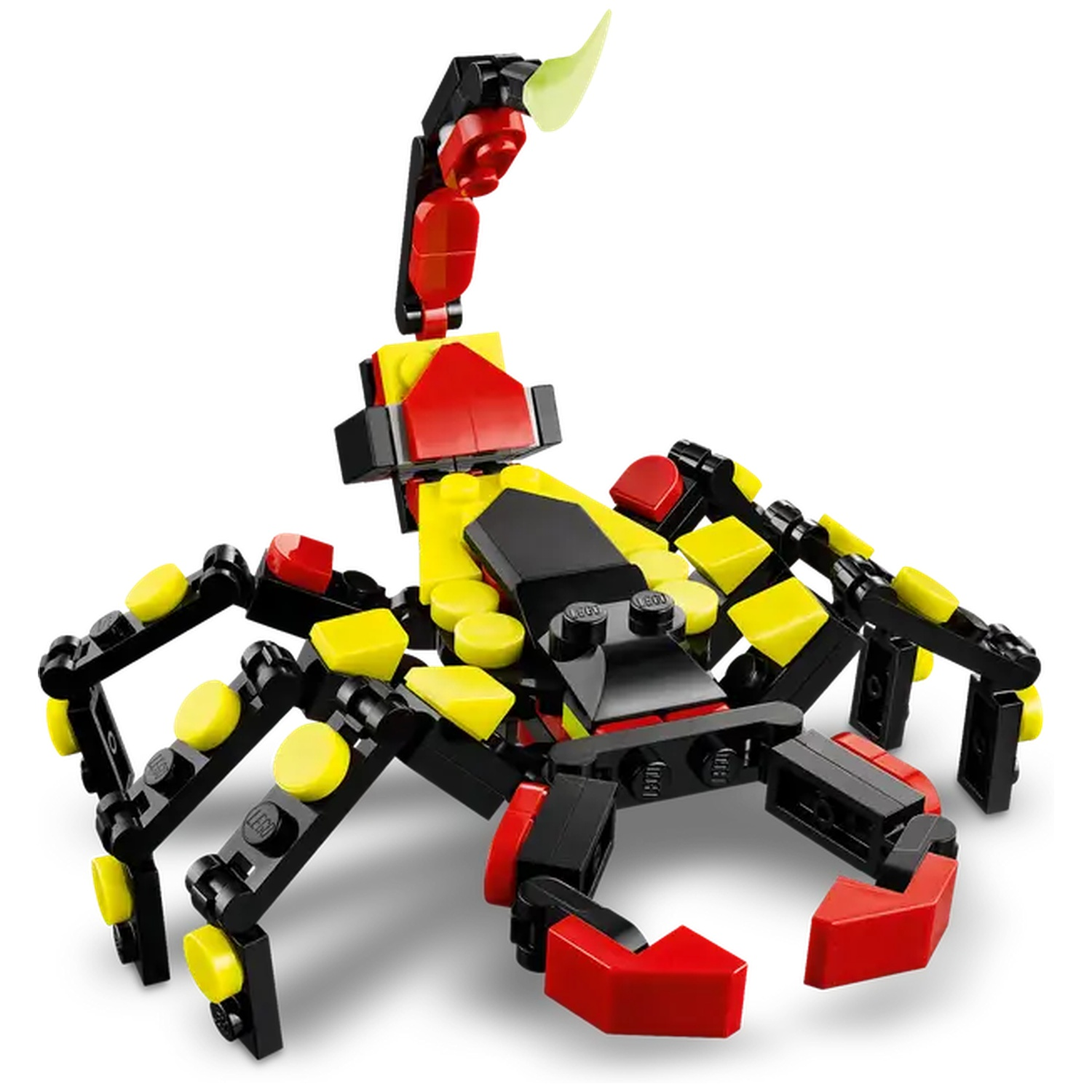 A Lego scorpion, black with yellow and red accents. It has a curved tail, segmented body, and pincers, set on a white background.