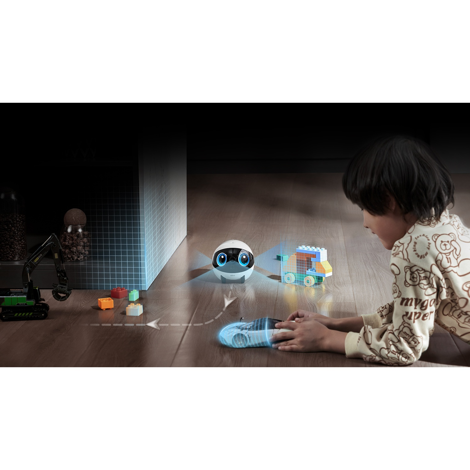 Un bambino gioca con un robot e blocchi giocattolo. Un escavatore giocattolo è sullo sfondo. Il robot ha una scia di luce blu.
