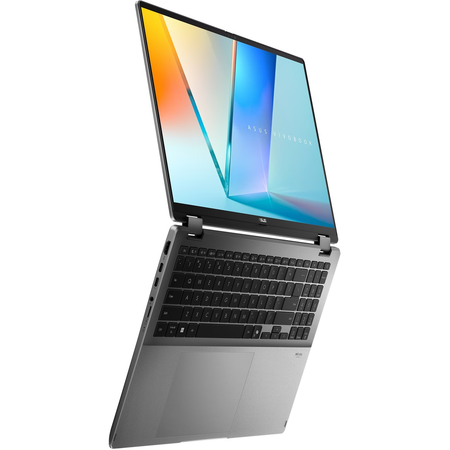 Un ordinateur portable gris Asus Vivobook est ouvert. L'écran affiche une image abstraite colorée. Le clavier est visible.