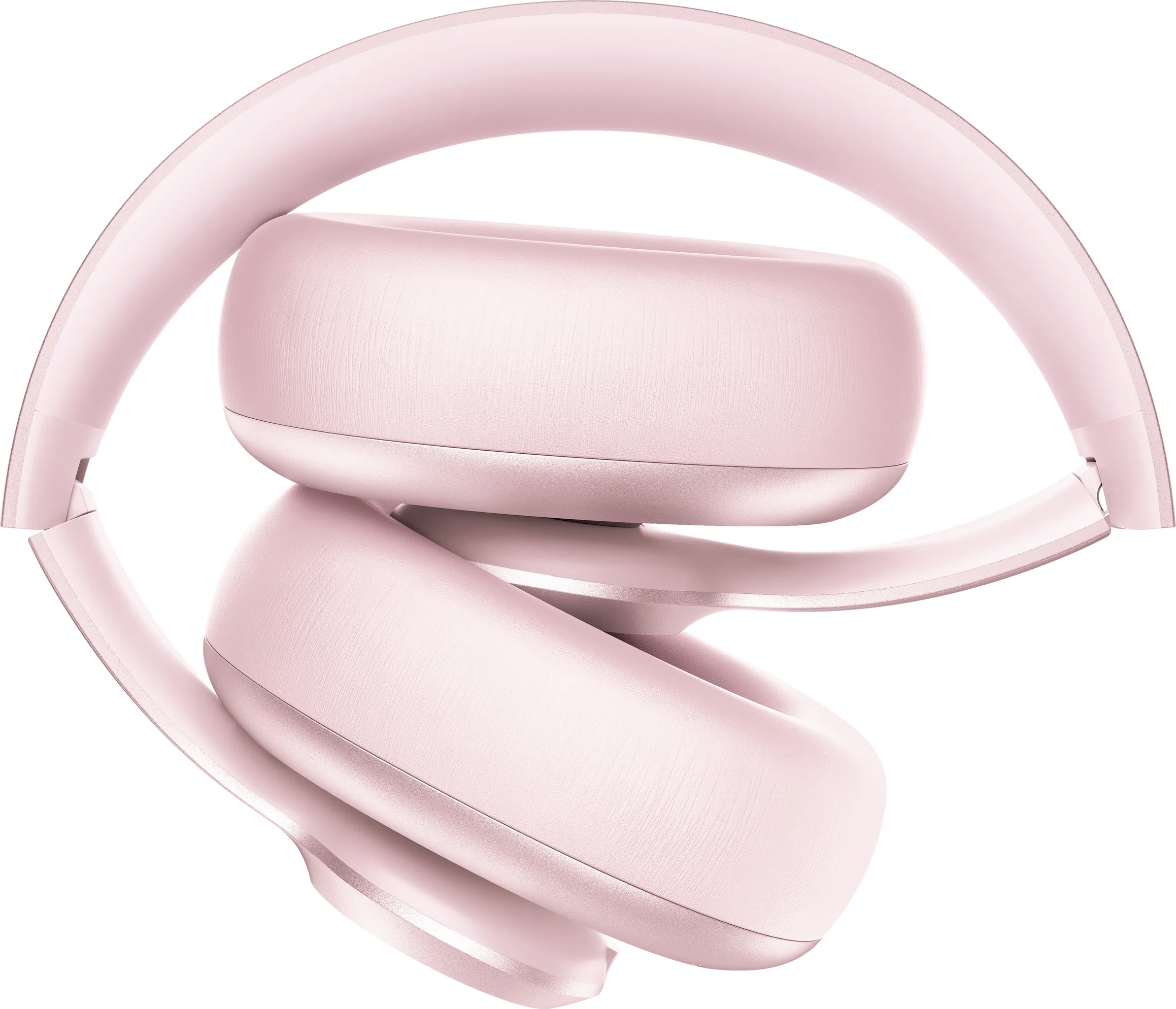 Casque rose plié sur fond blanc. Les écouteurs et l'arceau sont visibles.