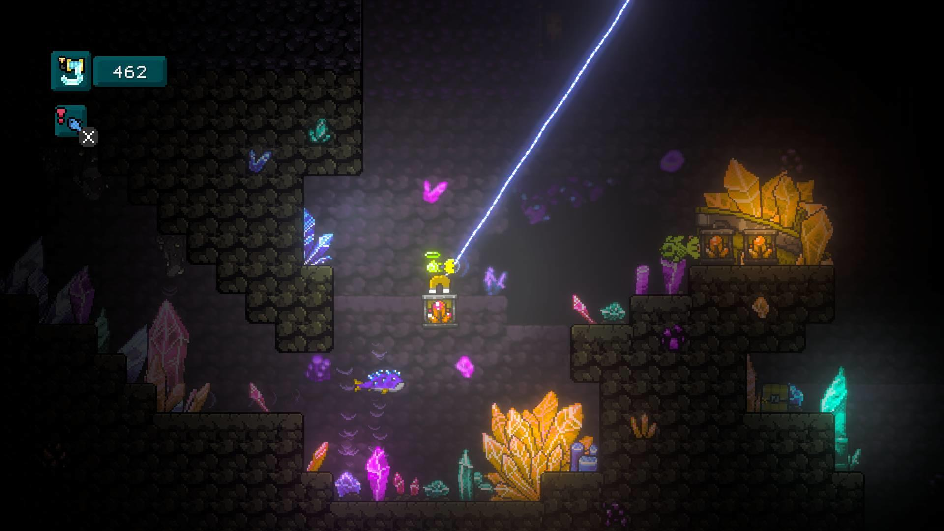 Eine pixelige Spielszene mit einer Figur in einem Käfig, Kristallen und einem Lichtstrahl in einer dunklen Höhle.