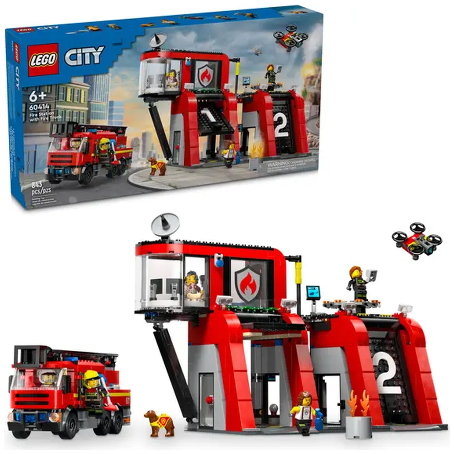 Lego City fire station set with fire truck, figures, and drone. Includes a red and gray fire station with a number 2.