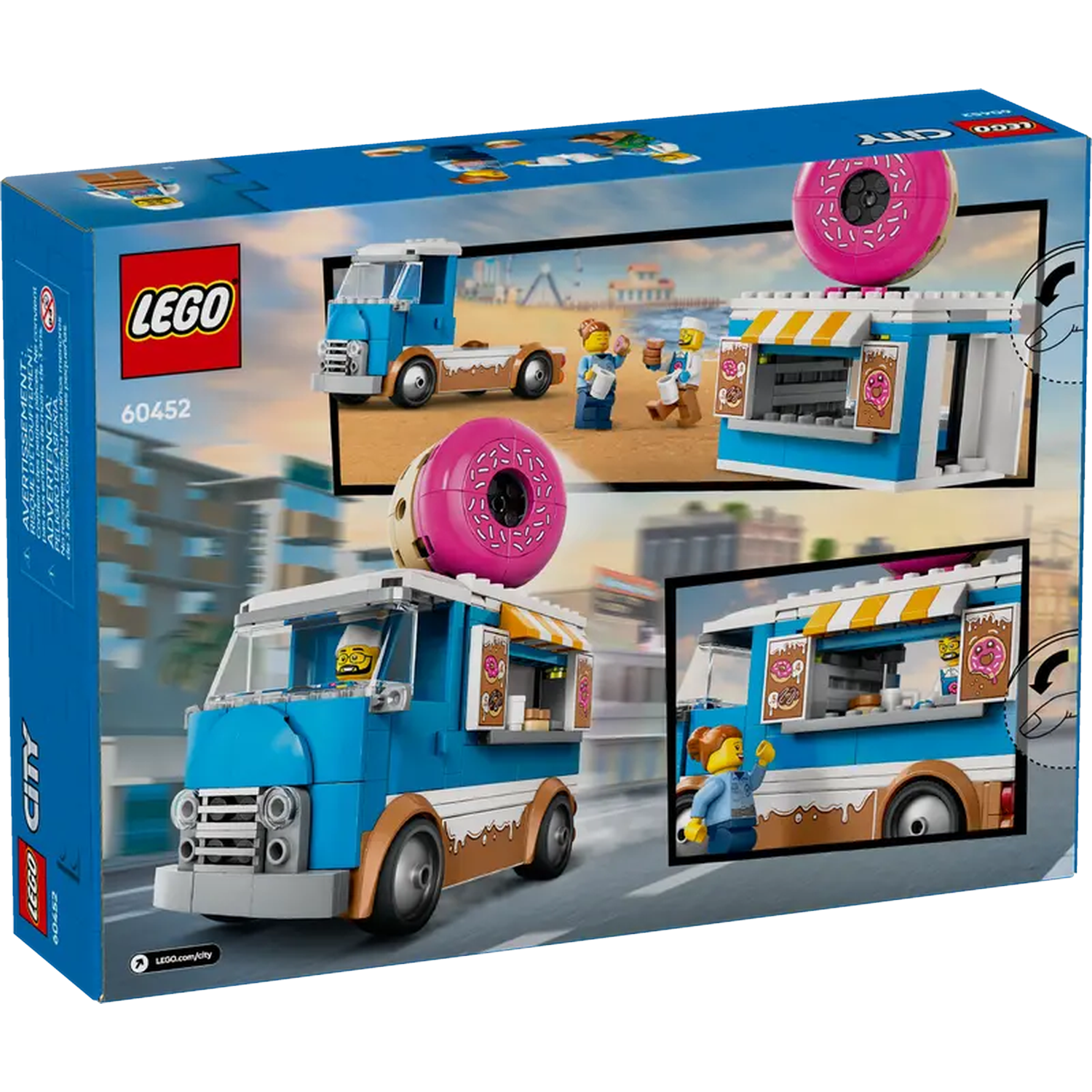 LEGO City set box. Features a blue donut truck, donut shop, and minifigures. Donuts are pink and brown. The background is a beach.