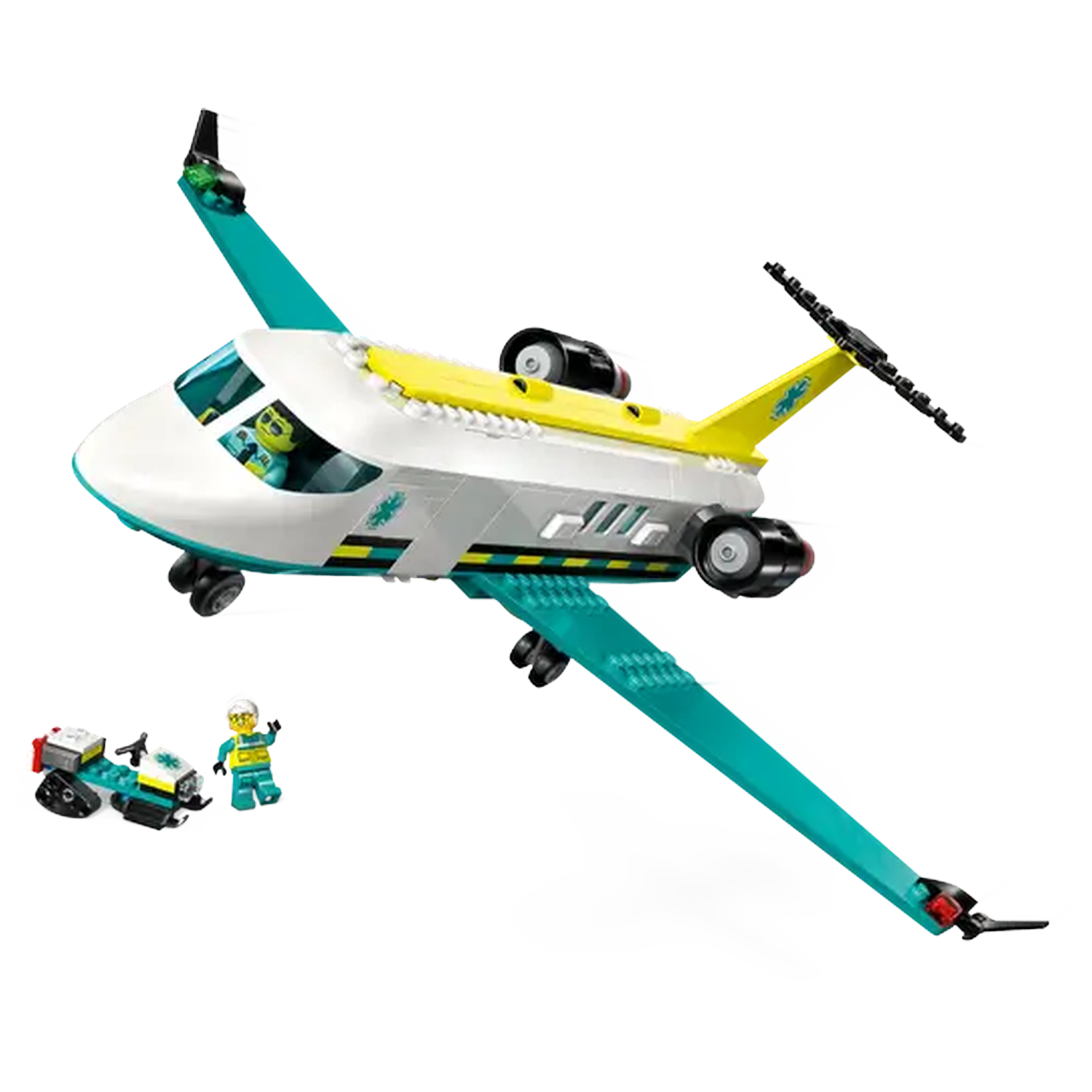 A toy airplane with teal wings, yellow accents, and a white body. Includes a small medical vehicle and a figure waving. 