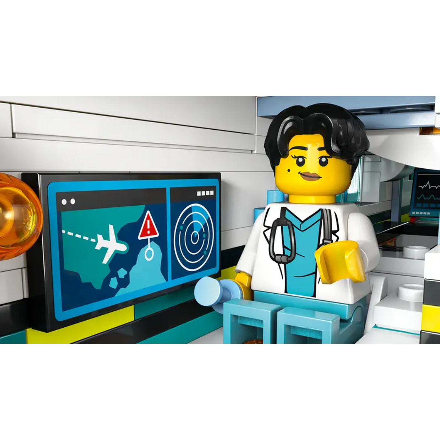 A Lego doctor sits near a screen with flight info. The doctor wears a white coat and has black hair. A hazard sign is on the screen.