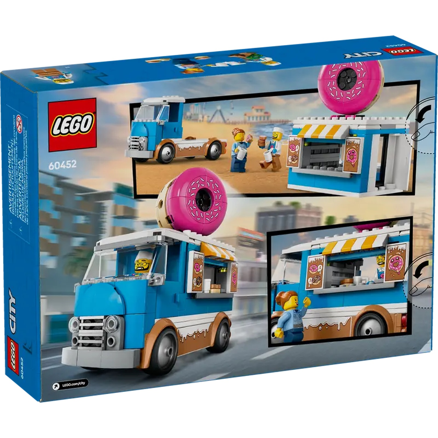 Lego City doos. Toont een blauwe en bruine donuttruck, een donutwinkel en minifiguren. Een grote roze donut staat bovenop de truck.