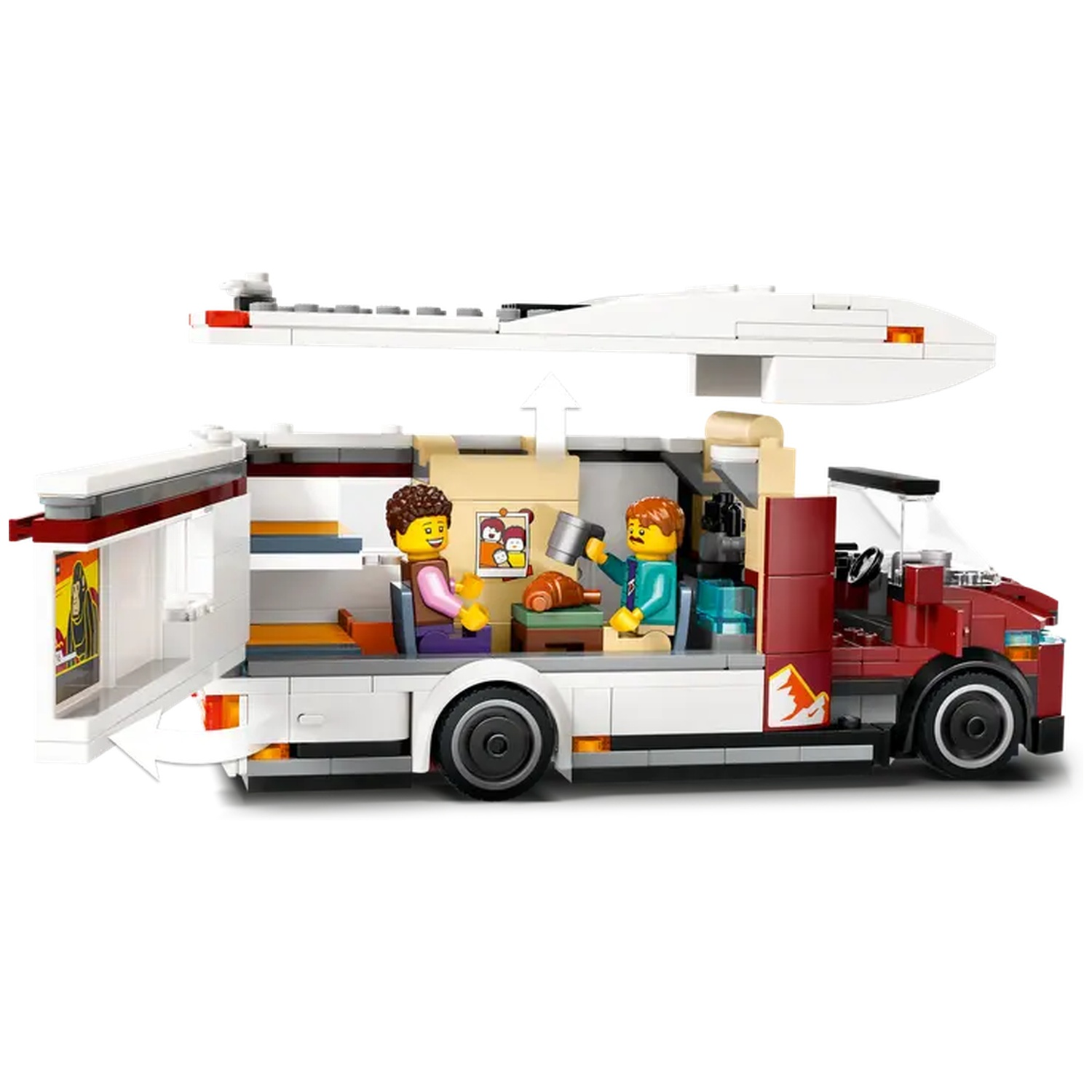 A Lego camper van with two figures inside. One figure is holding a mug and the other is holding a food item.