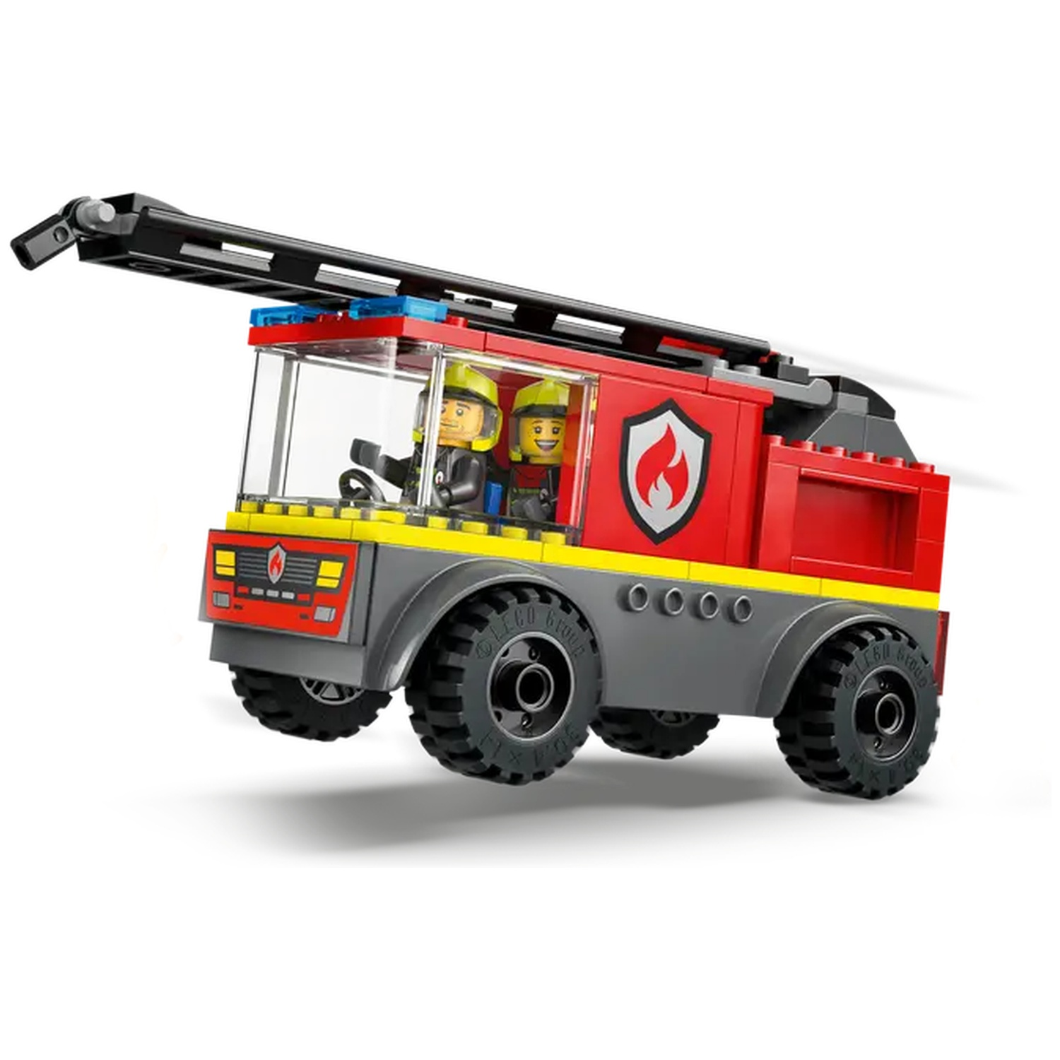 A red Lego fire truck with two minifigures inside. It has a ladder on top and large tires. The background is white.