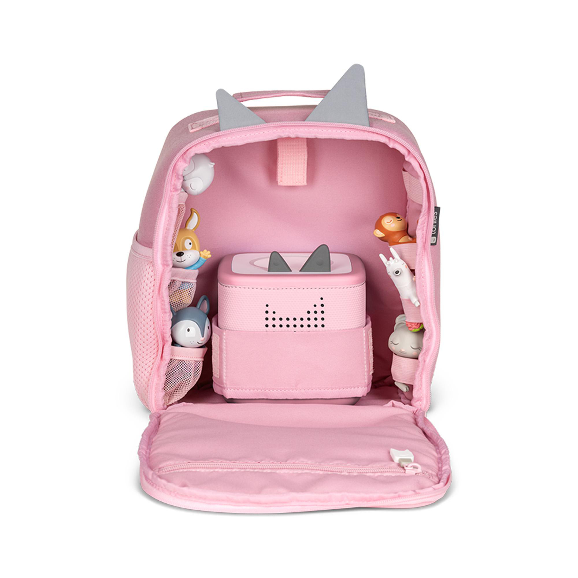 Rosa Rucksack mit grauen Ohren, geöffnet, um einen rosa Lautsprecher und Spielzeugtiere in Taschen zu zeigen.