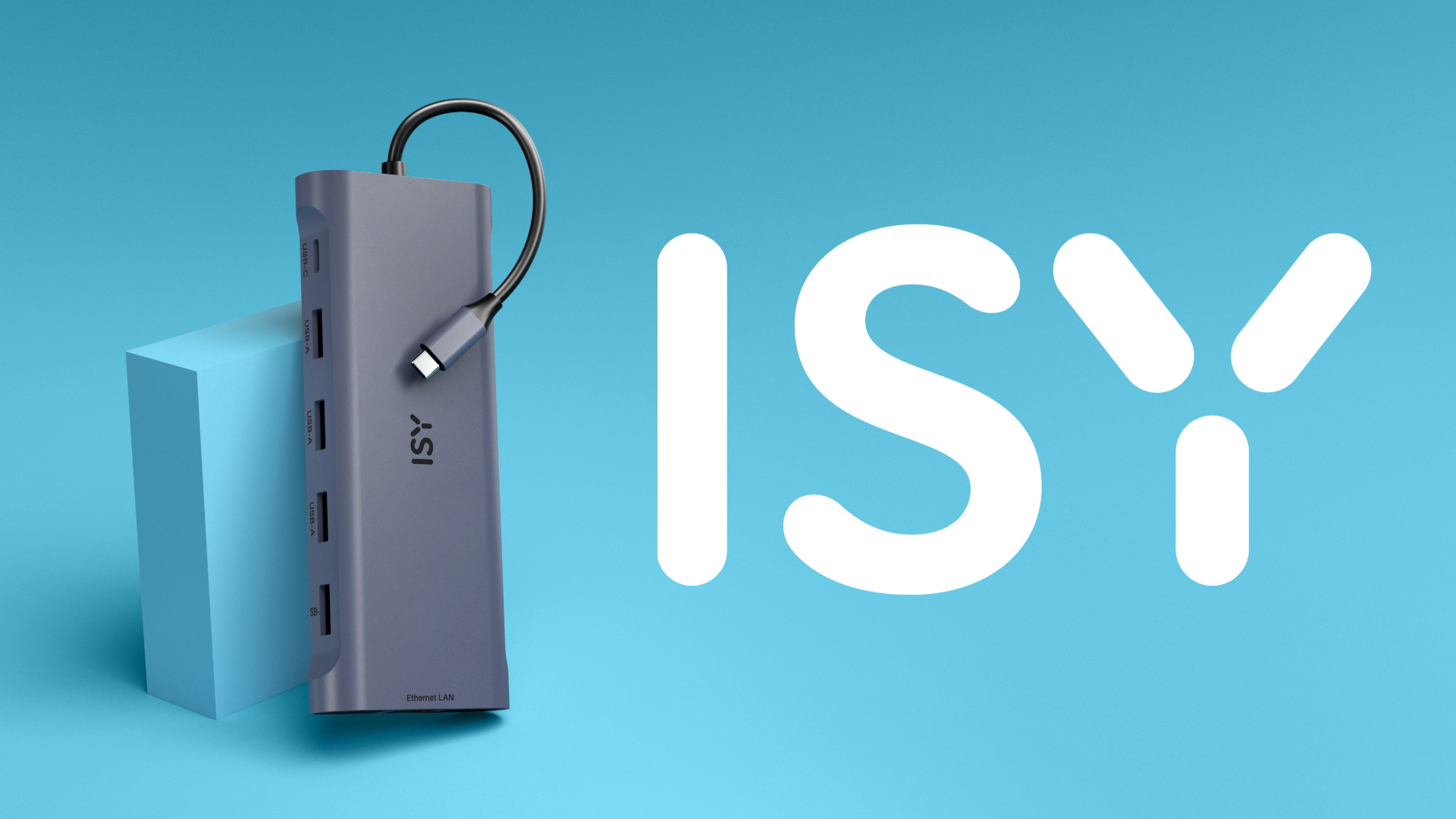 Szary hub USB ISY z czarnym kablem po lewej stronie. Jasnoniebieska kostka w tle z białym napisem ISY.