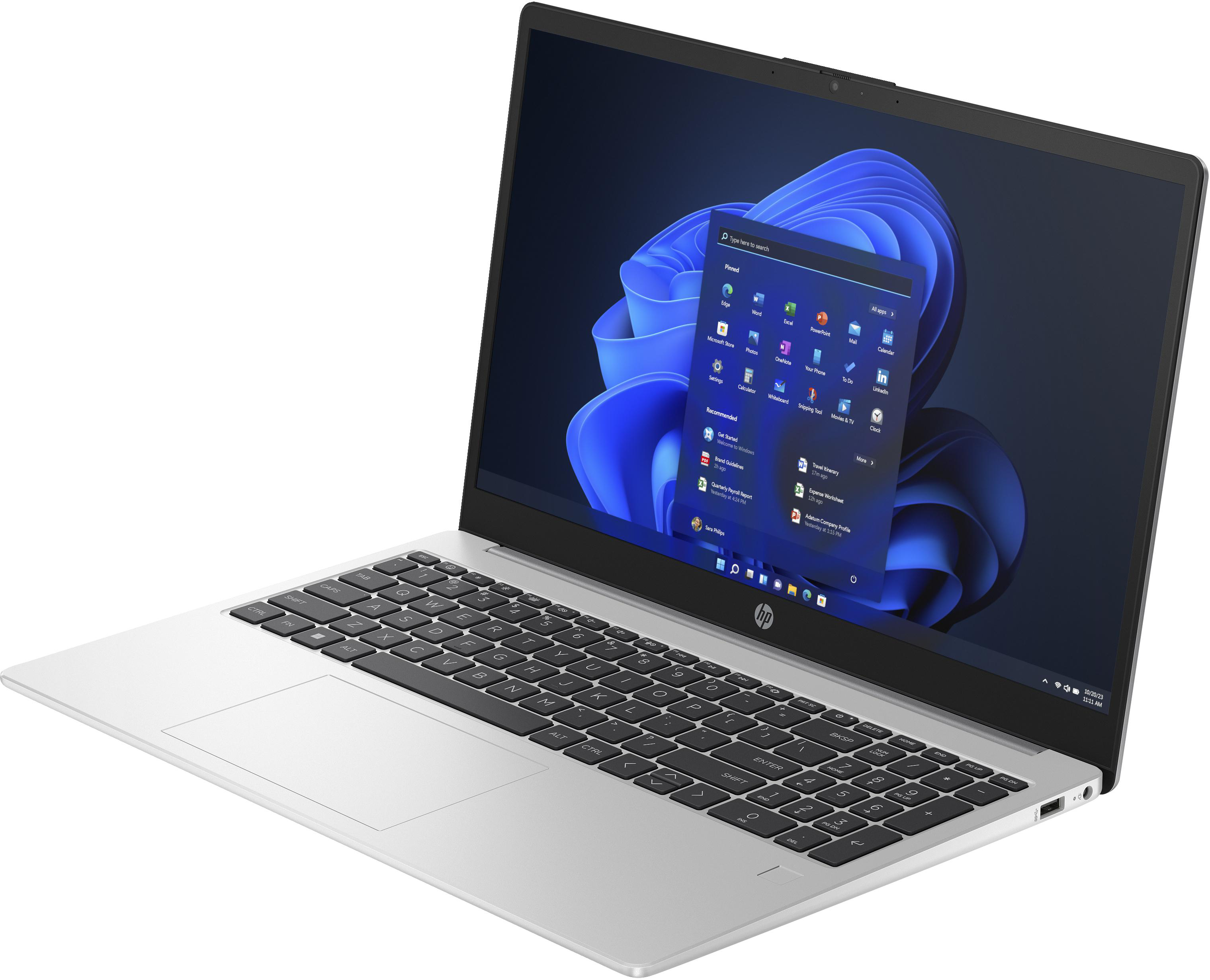 Silberner Laptop, geöffnet, zeigt Windows 11 Oberfläche. Tastatur sichtbar, Bildschirm zeigt App-Symbole.
