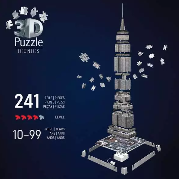 Ein 3D-Puzzle eines Turms wird gezeigt. Es besteht aus vielen Puzzleteilen. Die Teile sind um den Turm in der Luft verstreut.