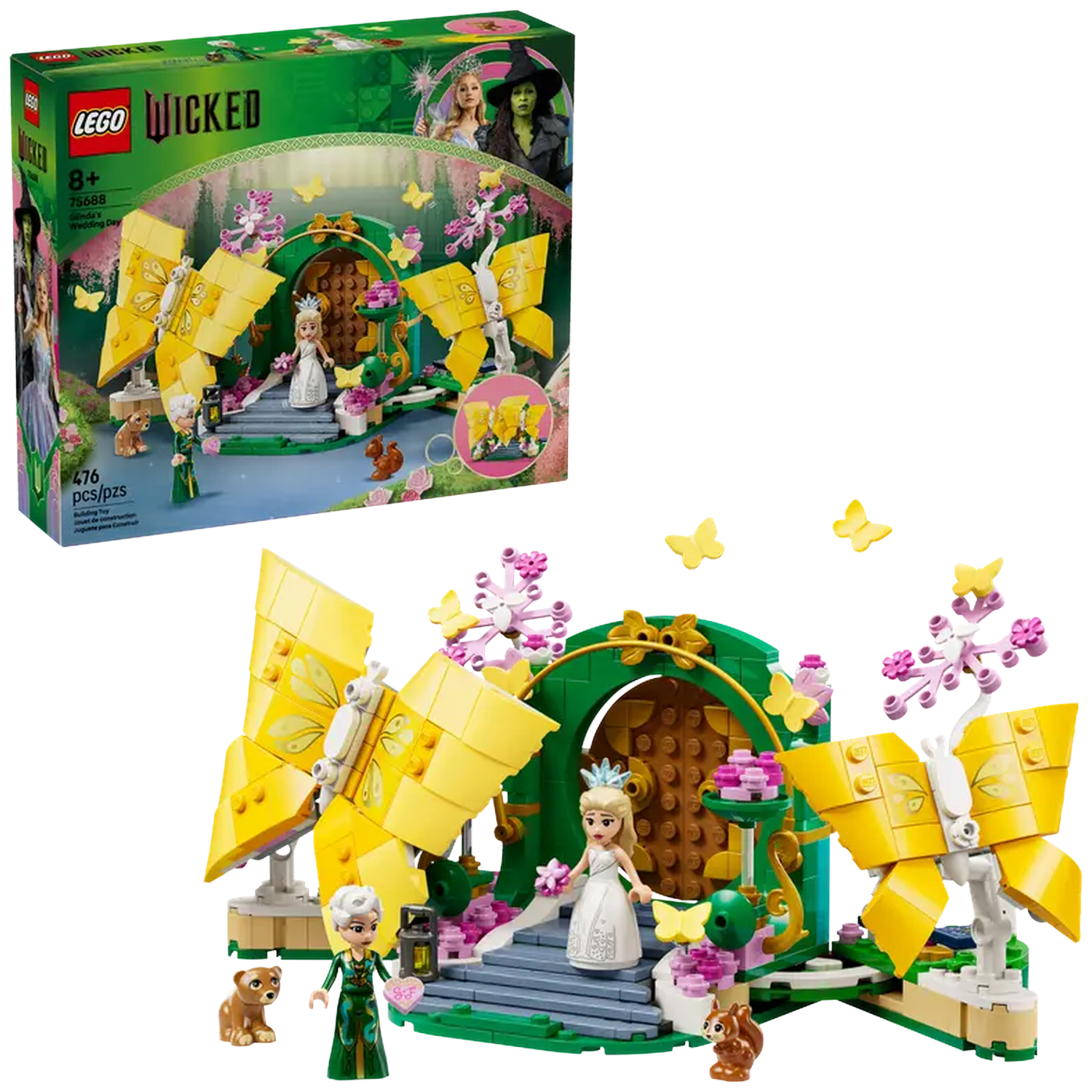 Lego set depicts Glinda's Wedding Day. It has figures, a green archway, yellow butterfly wings, and a box with characters on it.