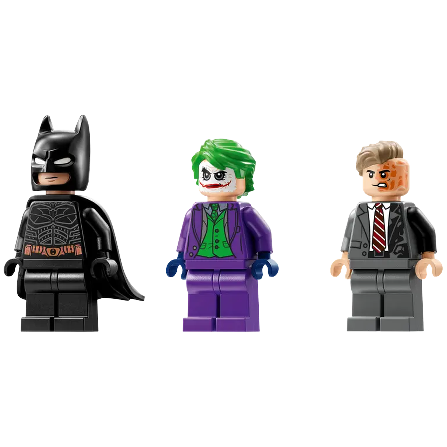 Three Lego figures: Batman in black, The Joker in purple and green, and Two-Face with a burned face.