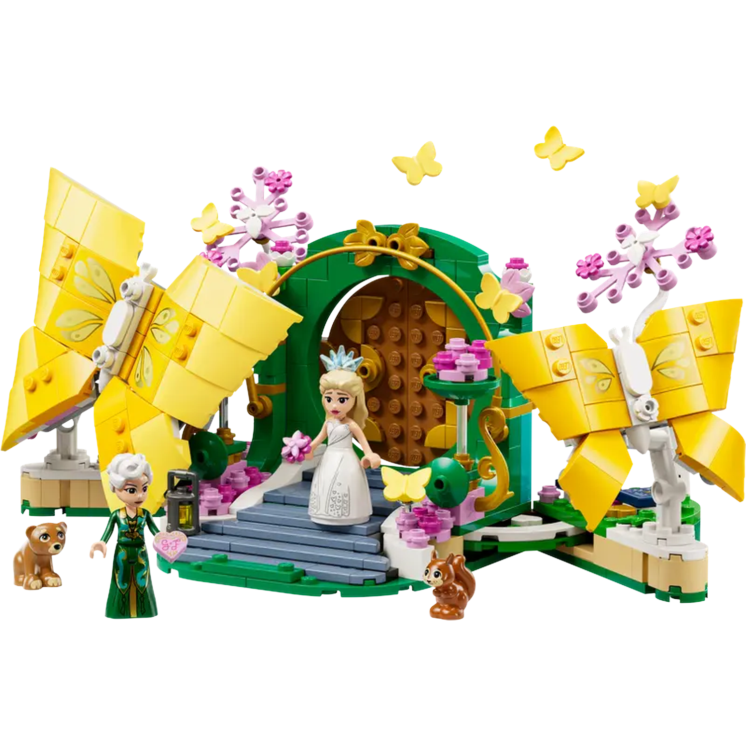 Lego-set met Elsa in trouwjurk, Anna met een hart en een bruine beer. Gele vlinders en bloemen.