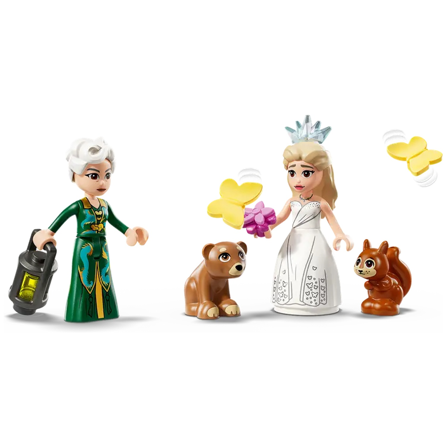 Lego set met twee figuren, een beer, een eekhoorn en twee gele vlinders. Eén figuur draagt een groene jurk, de andere een witte jurk.
