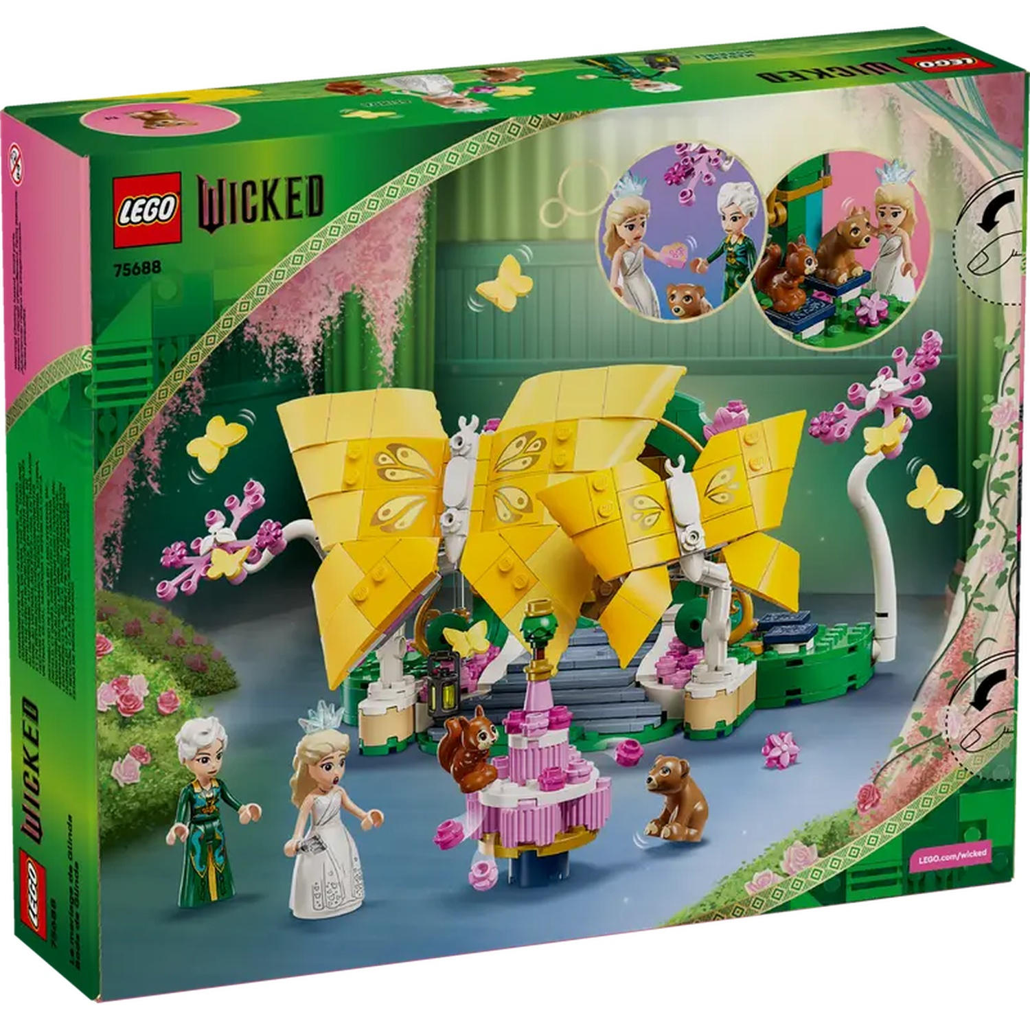 Lego Wicked doos. Met gele vlinder, Glinda en Elphaba figuren. Roze bloemenachtergrond en een roze taart.