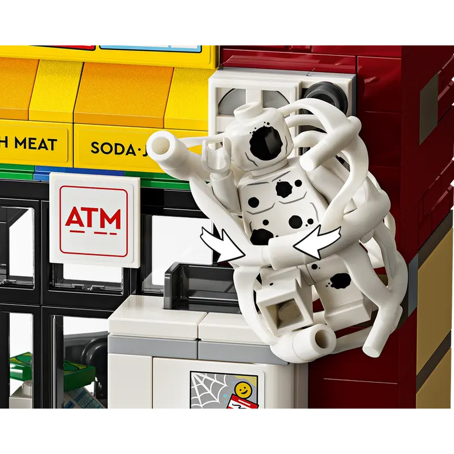 A Lego scene: a white figure with black spots, holding white tentacles, near a building. Signs say 'ATM', 'MEAT', and 'SODA'.