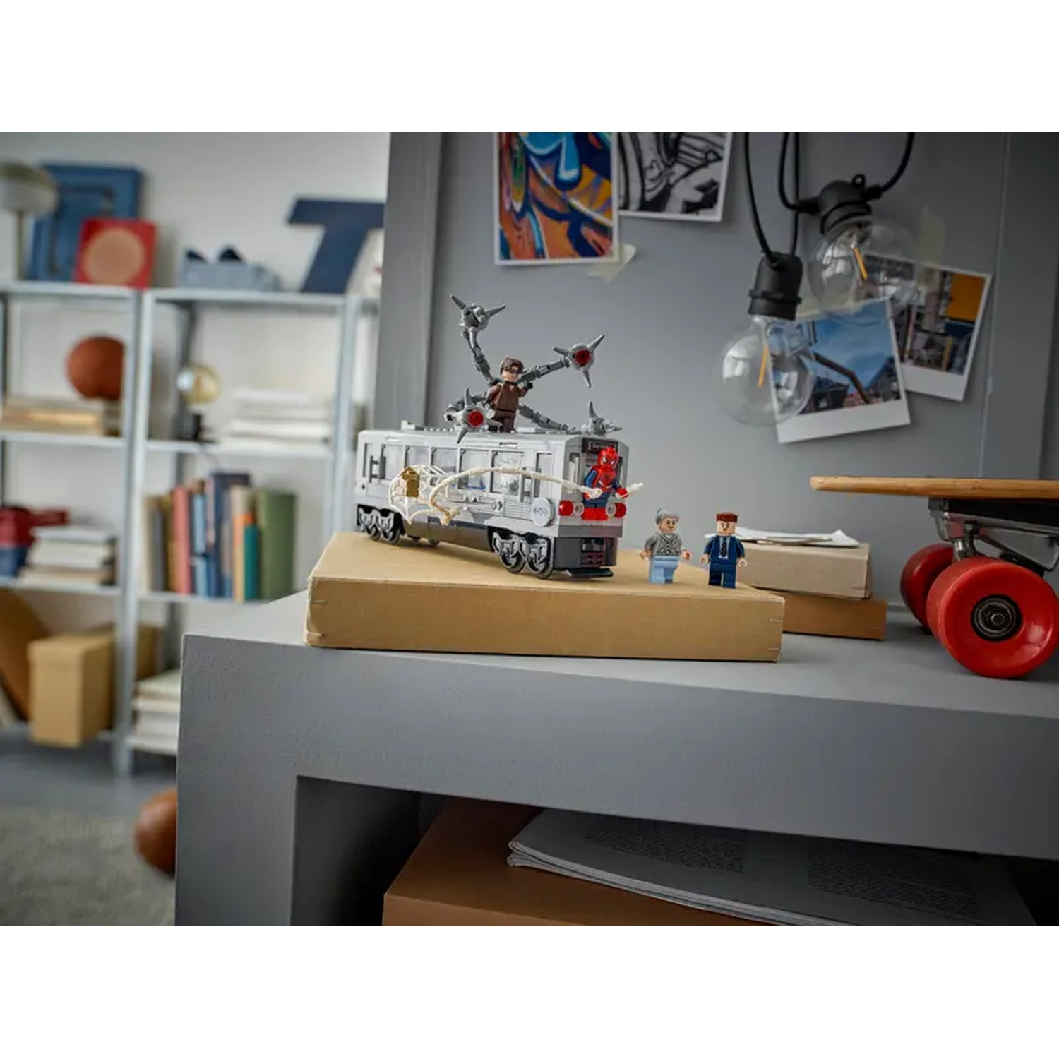 Lego set with train, Spider-Man and Dr. Octopus figures. Background includes a shelf with books, and a skateboard.