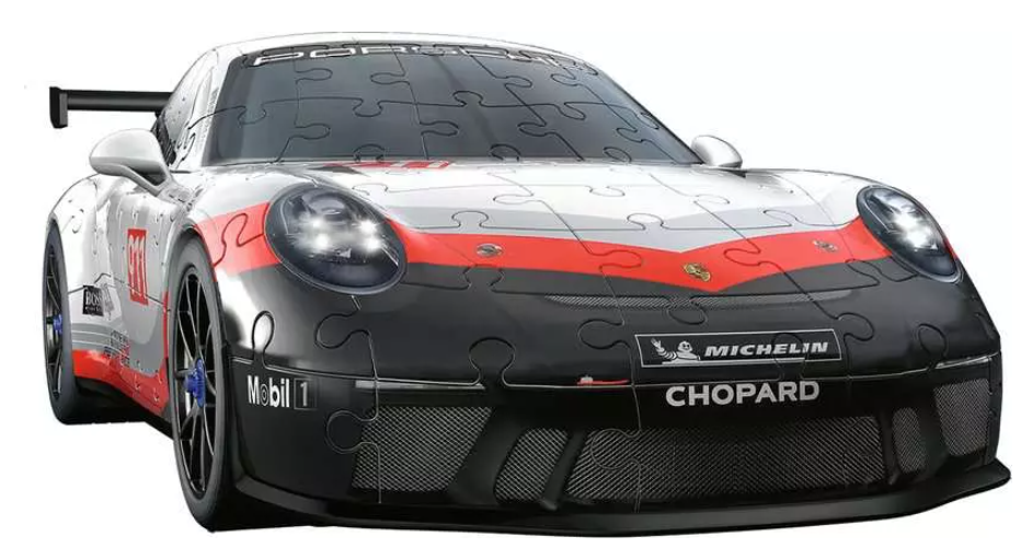 Ein Porsche 911 Rennwagen-Puzzle mit schwarzen, roten und weißen Farben. Es hat Sponsorenlogos und einen Heckflügel.