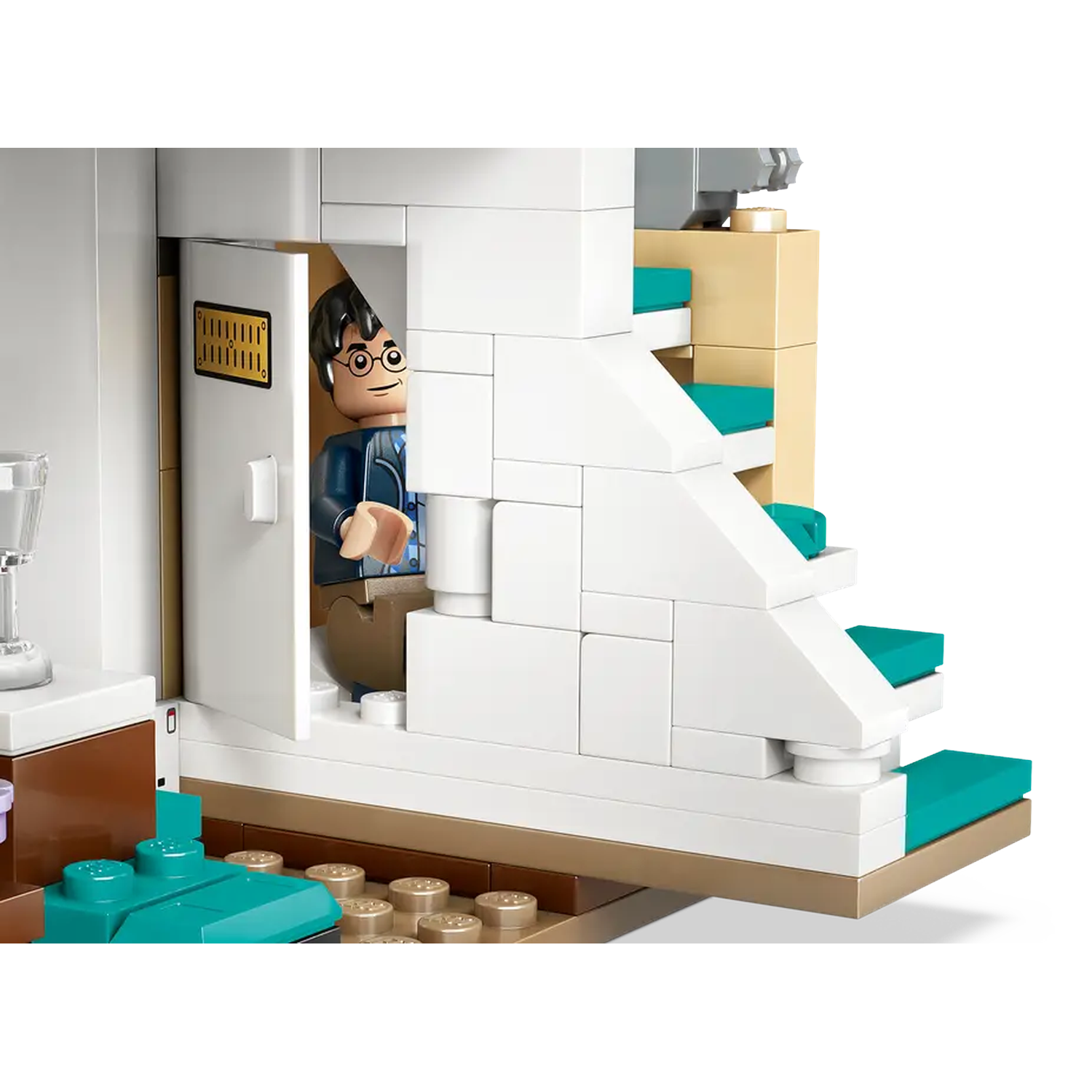 Lego set depicting a scene with a figure in a doorway. White, teal, and brown elements. Staircase on the right. Details on the door.