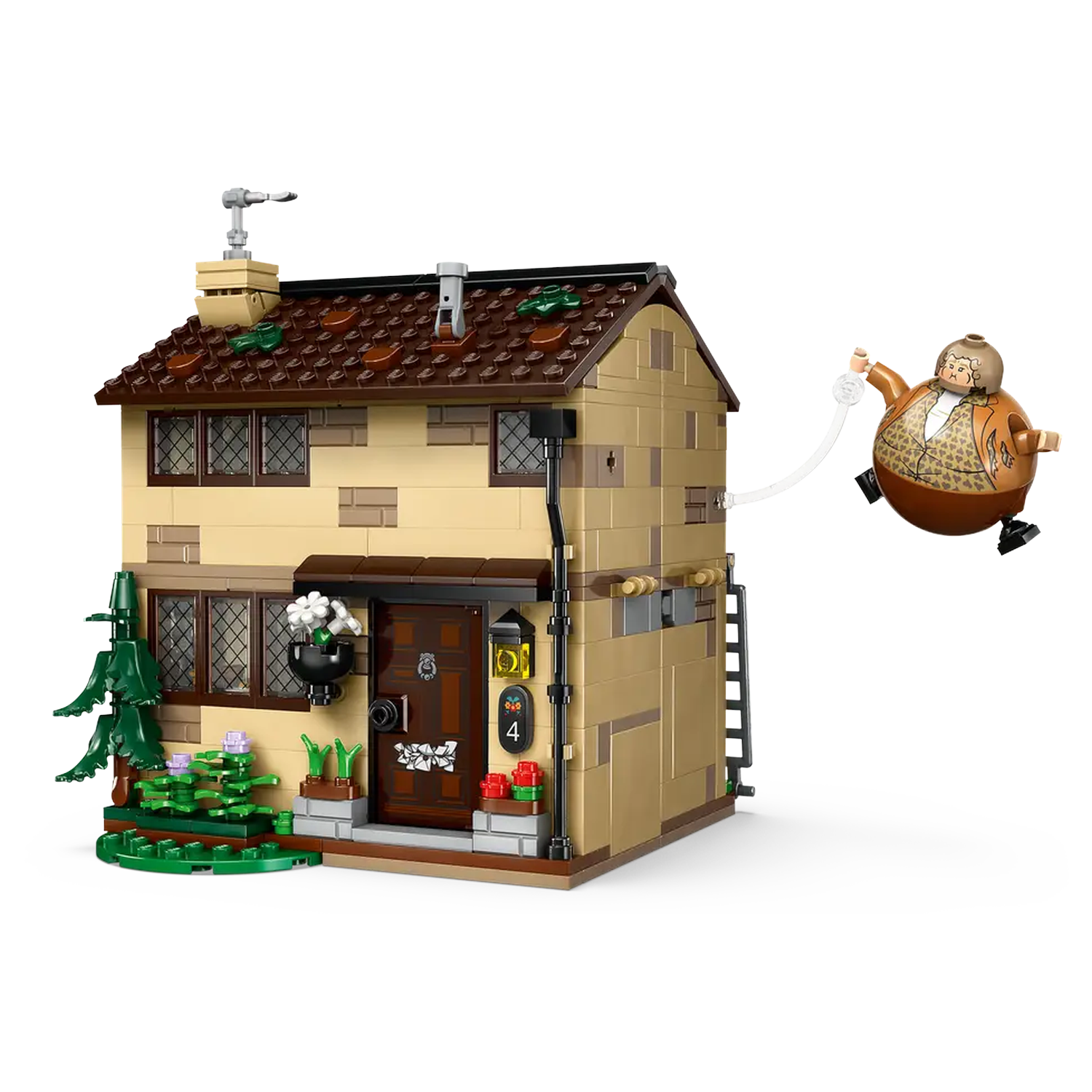 Lego house with brown roof and tan walls. A figure floats in the air, connected to the house. Green bushes and flowers are in front.