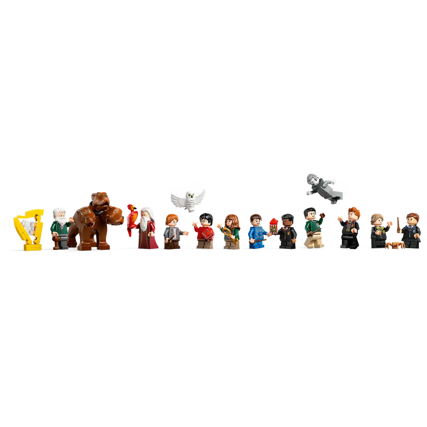 Lego Harry Potter set. Includes figures of characters, like Dumbledore, Harry, Ron, and others. A brown creature is also present.