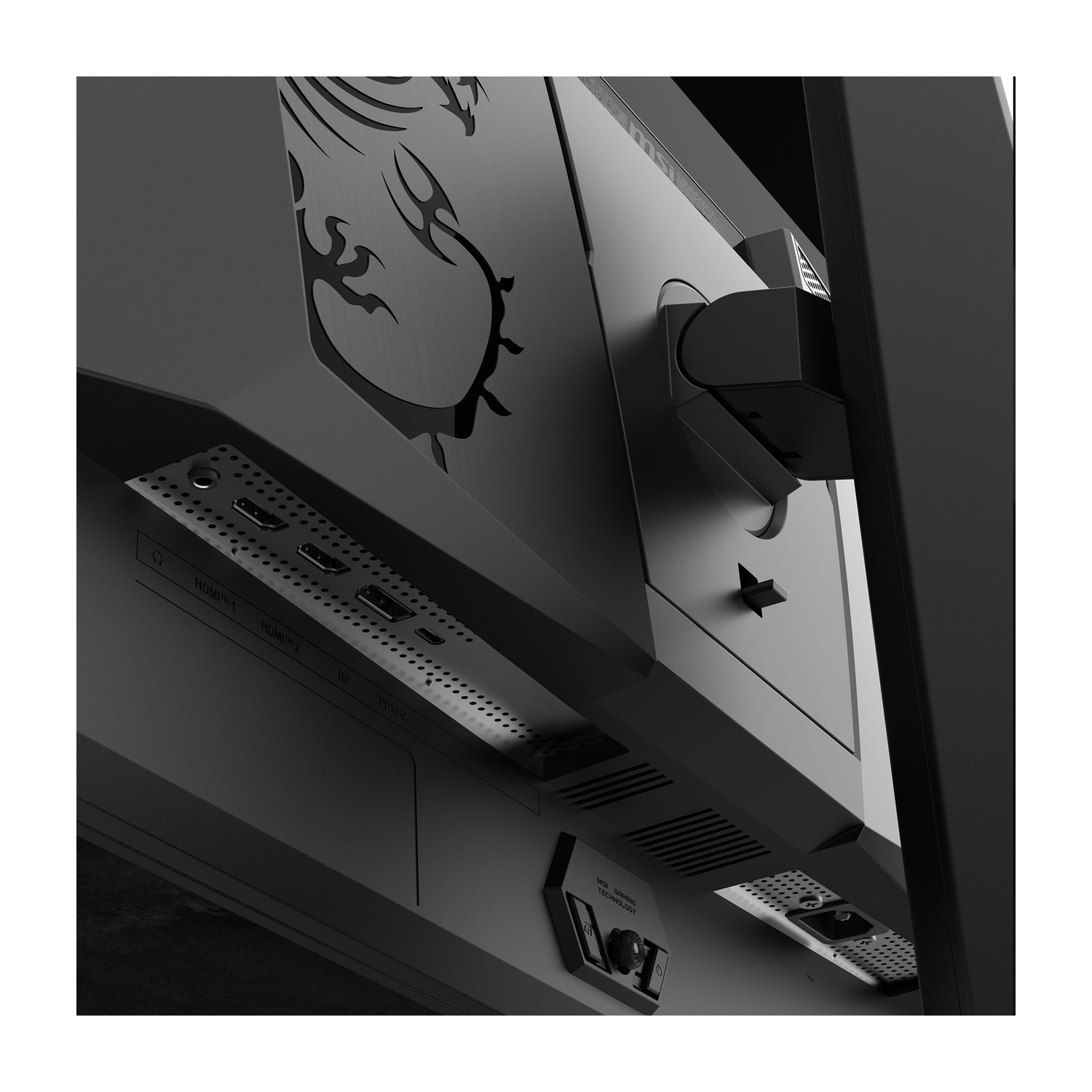 Primo piano di un monitor di computer nero. Il retro ha porte, un logo a forma di drago e il marchio MSI.