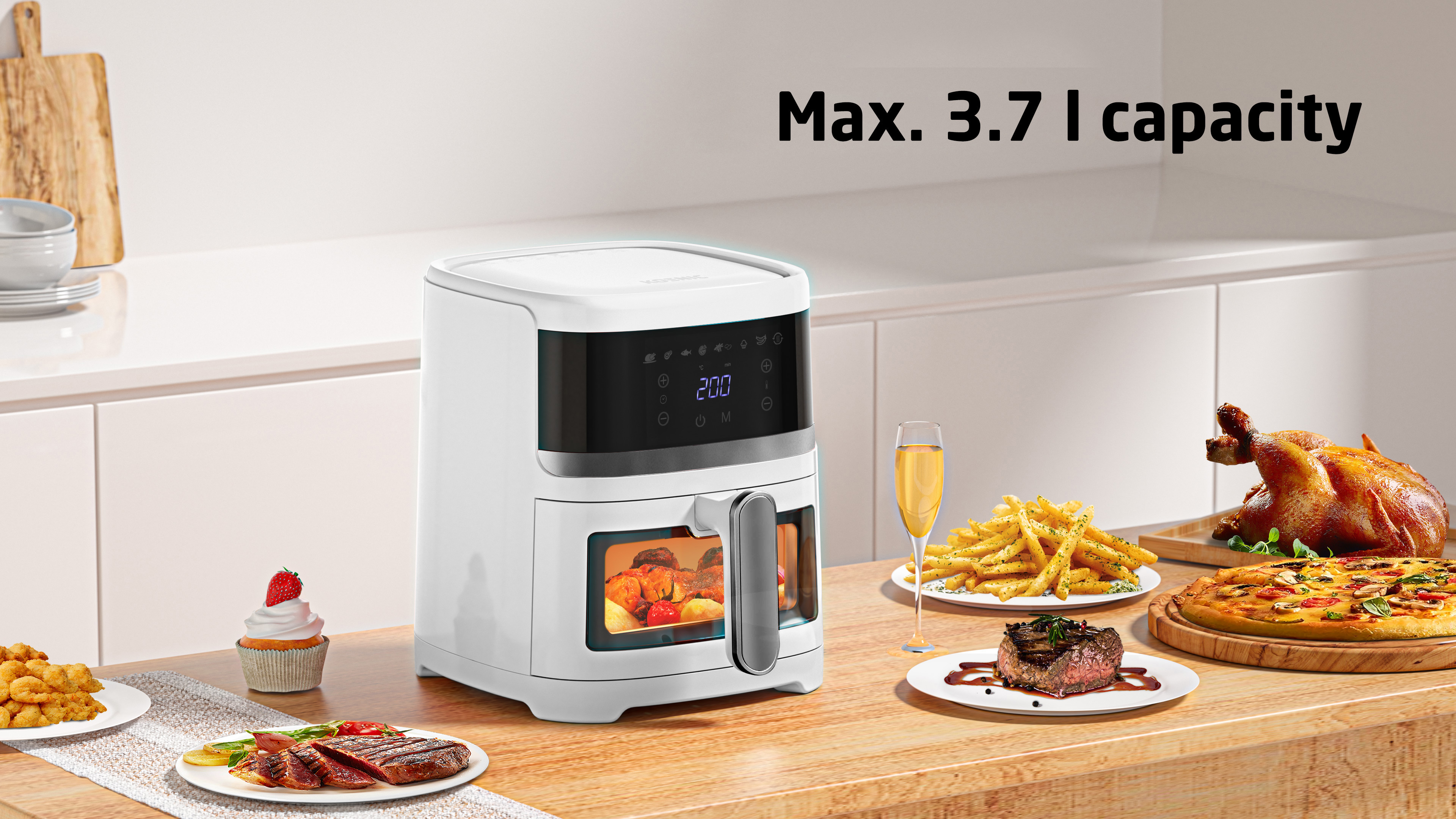 Frytownica beztłuszczowa z przykładami jedzenia: stek, pizza, frytki, kurczak i babeczka. Tekst: Pojemność maks. 3,7 l.