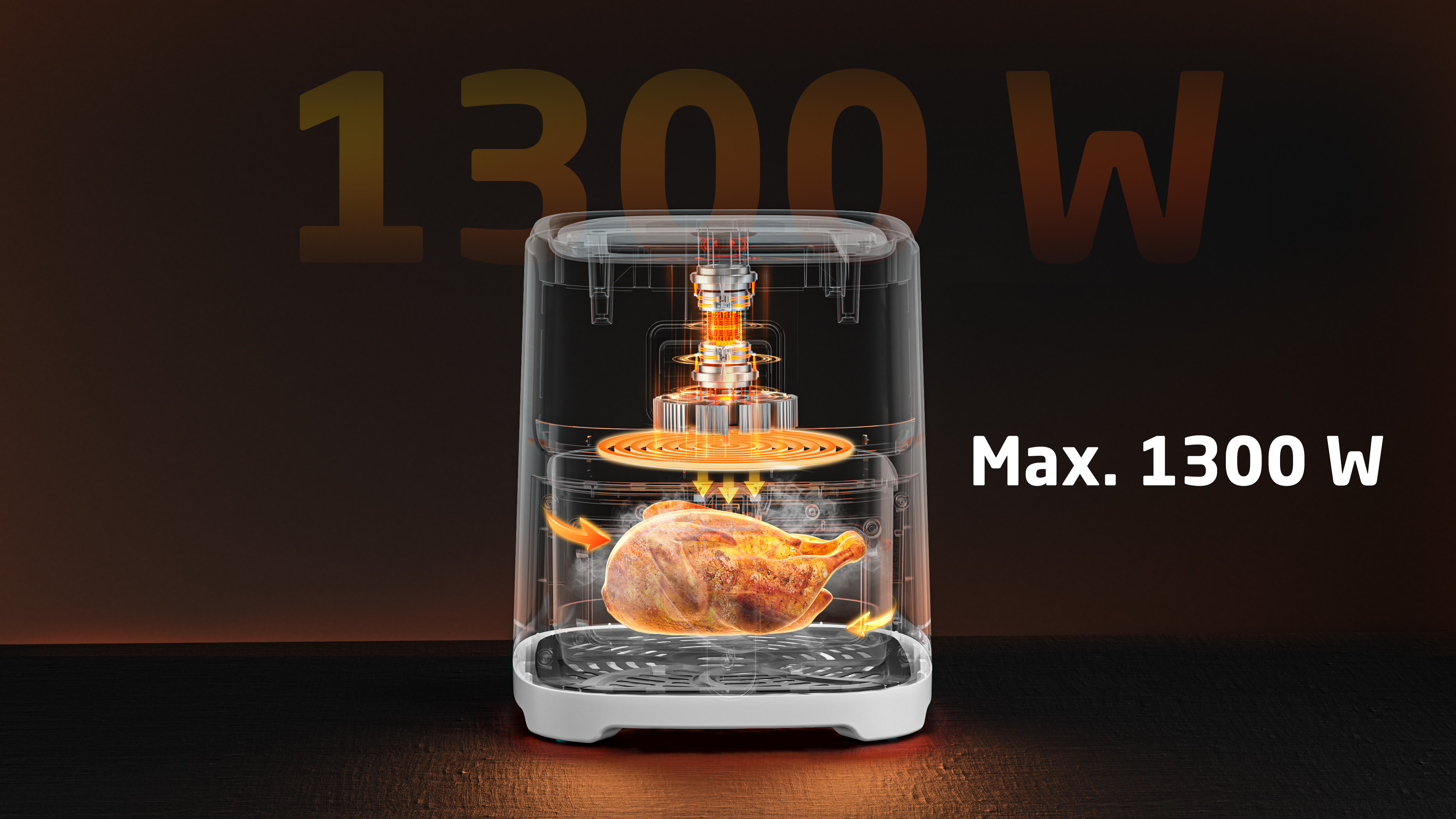 Frytownica beztłuszczowa pokazuje piekącego się kurczaka. Urządzenie jest przezroczyste, z pomarańczowymi akcentami i ma moc maks. 1300 W.