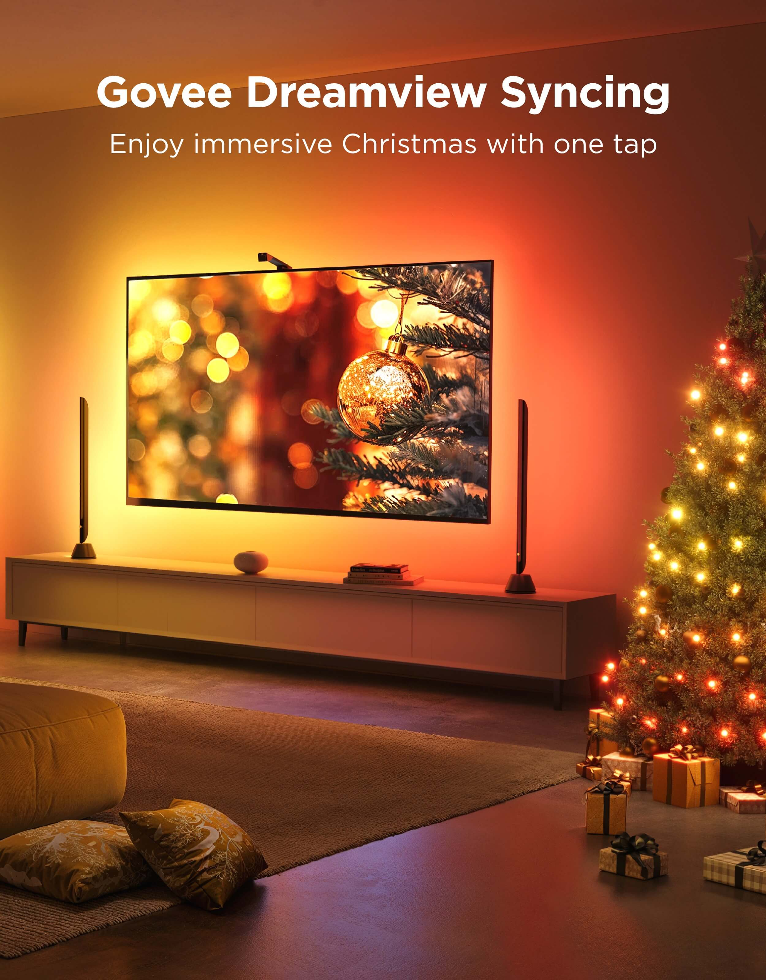 Nappali karácsonyfával, ajándékokkal és TV-vel. A TV karácsonyi díszt jelenít meg.