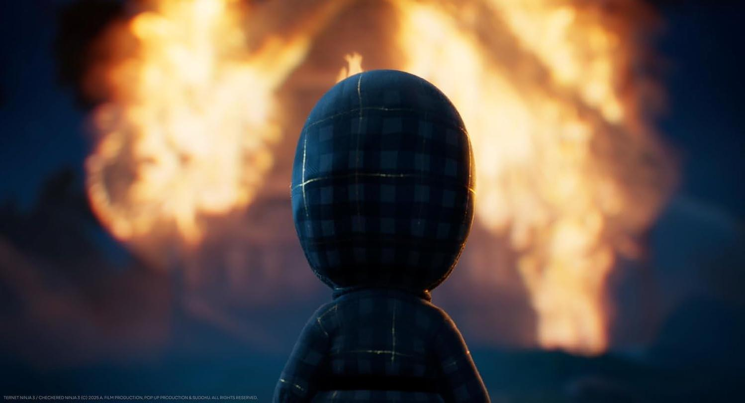 Eine Figur in einem karierten Anzug steht vor einer Explosion. Der Rücken der Figur ist dem Betrachter zugewandt, mit einem feurigen Hintergrund.