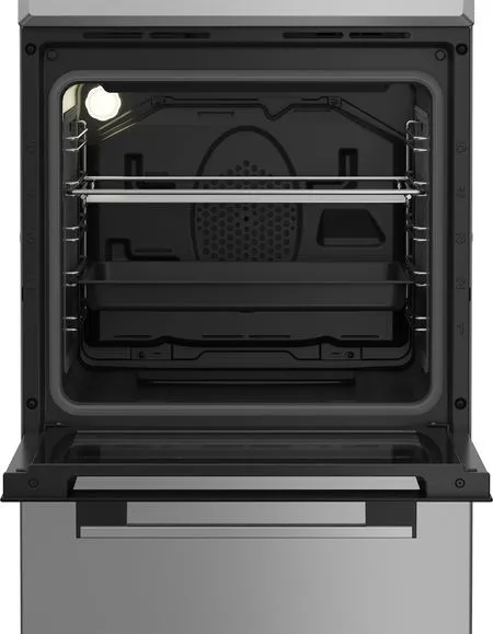 Intérieur du four ouvert montrant les grilles, le plat et la lumière. Extérieur en acier inoxydable avec un tiroir.