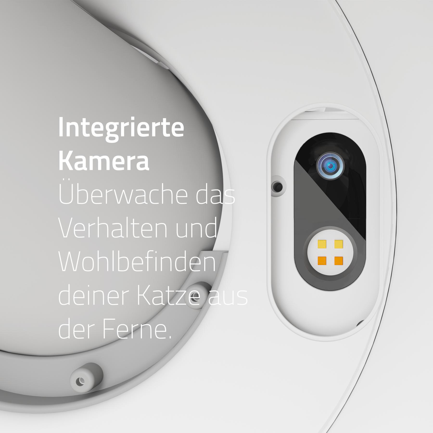 Ein weißes Gerät mit Kamera, schwarzer Linse und orangenen Quadraten. Text auf Deutsch: 'Integrierte Kamera'.
