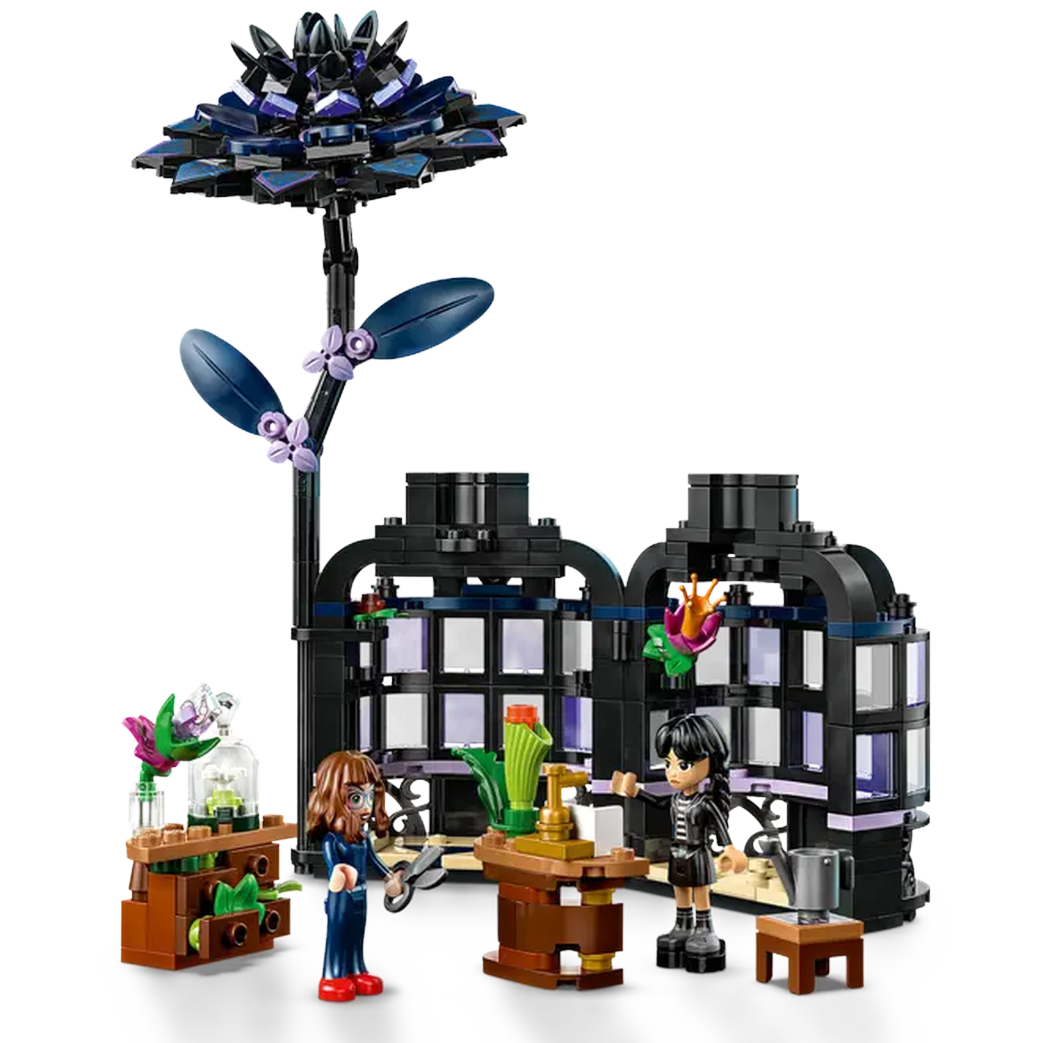 Legoset met twee figuren, een grote bloem en een gebouw. Eén figuur houdt een schaar vast. De andere figuur wijst naar een tafel.