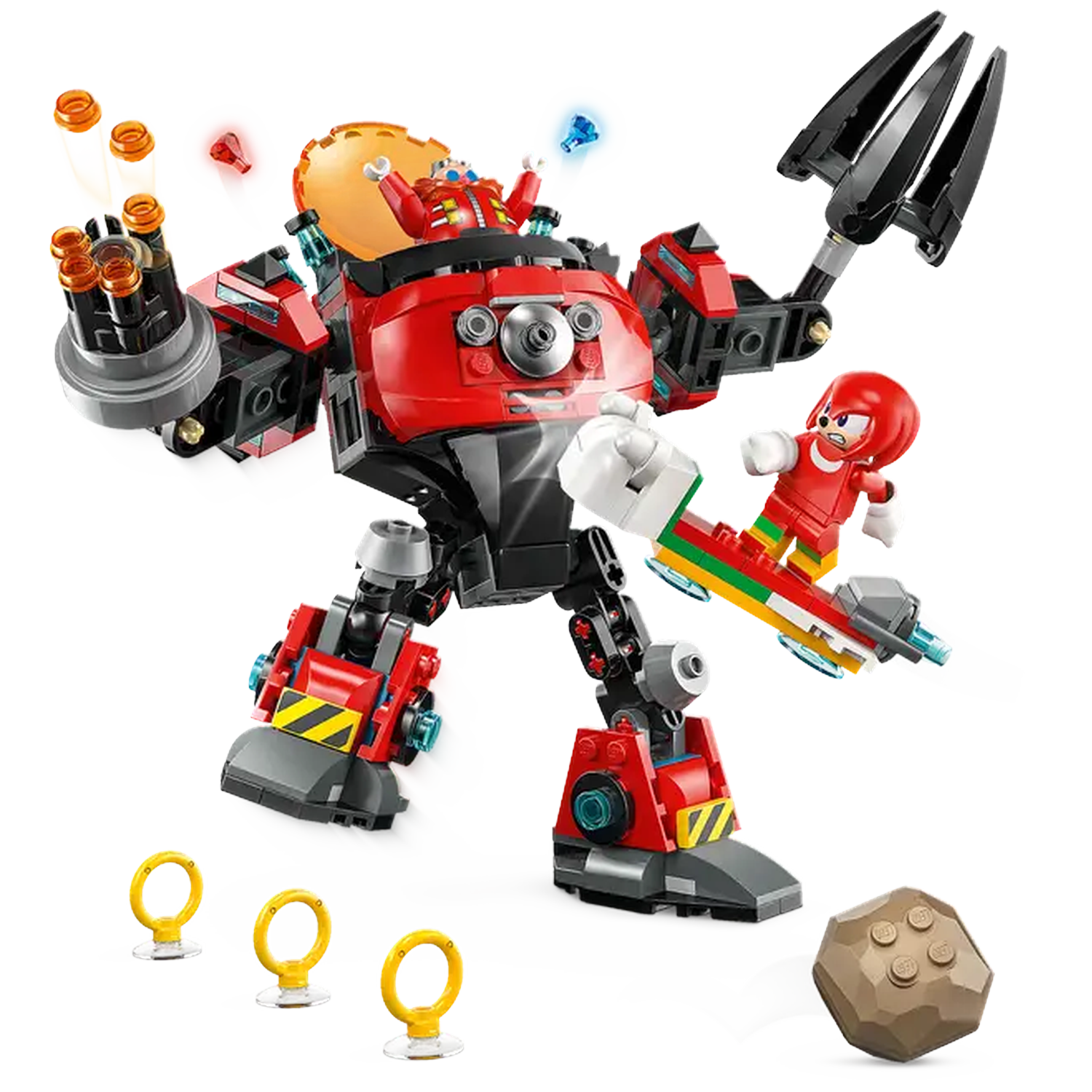 Lego set: Robot with Eggman inside, Knuckles on a board, rings, and a rock. Red, black, and yellow are dominant colors.