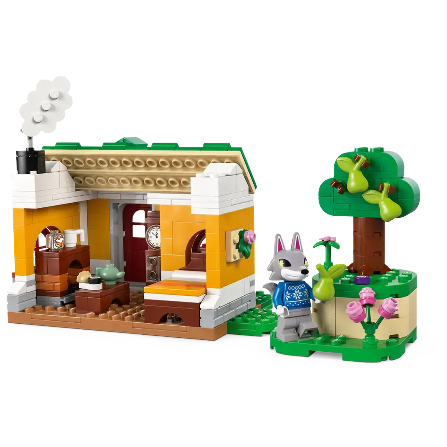 Een Lego-scène toont een huis met een wolf figuur. Het huis heeft een groen dak en gele muren. Er is ook een boom en bloemen aanwezig.