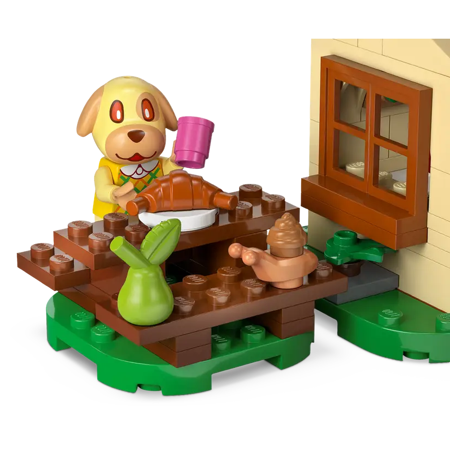 A Lego scene shows a dog character holding a pink cup, croissant, and green pear. A brown window is in the background.